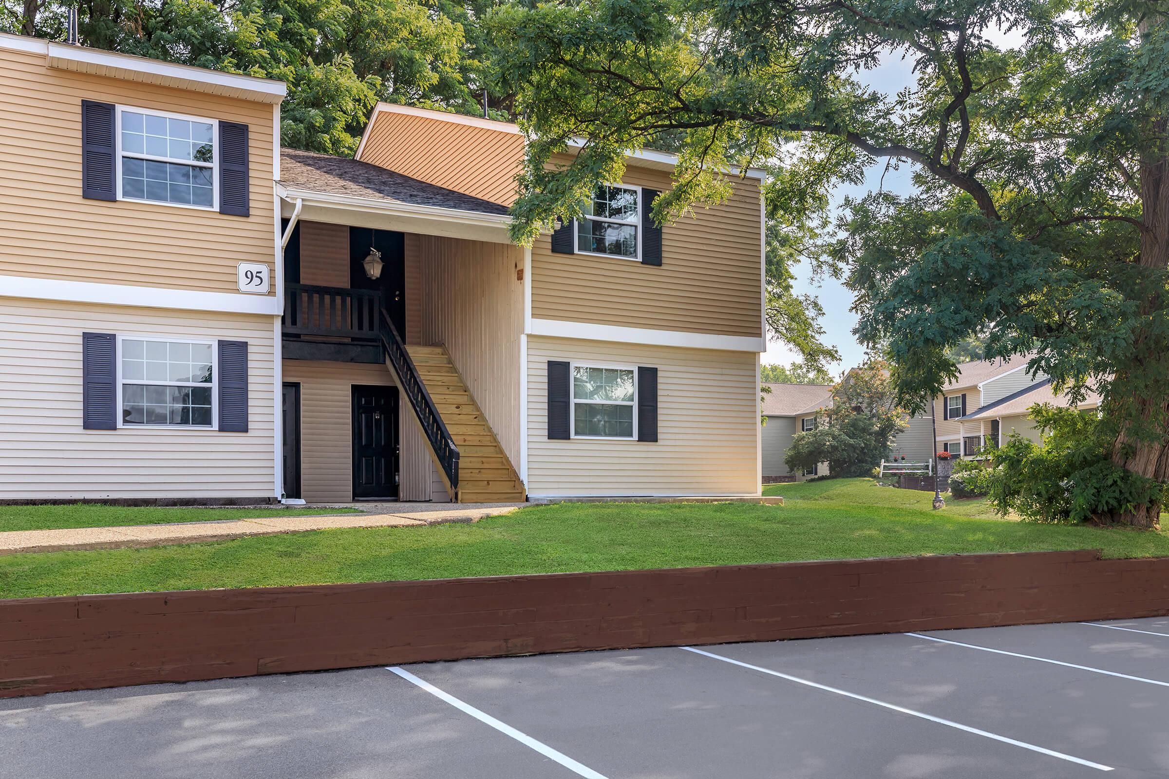 a house that is parked on the side of a road