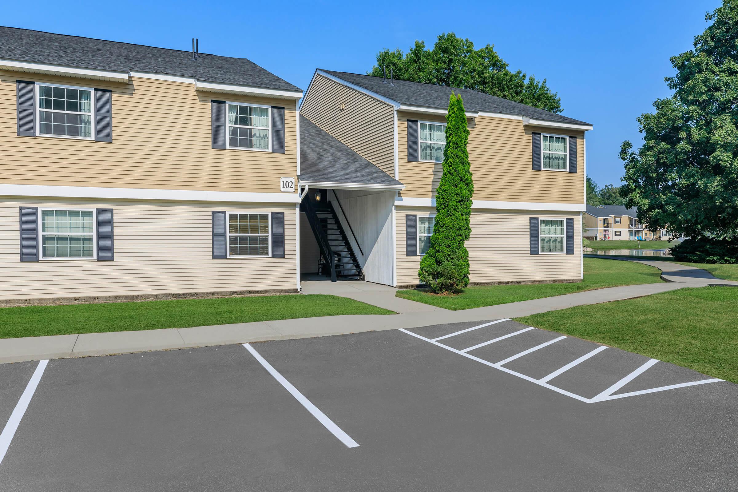 a close up of a street in front of a house