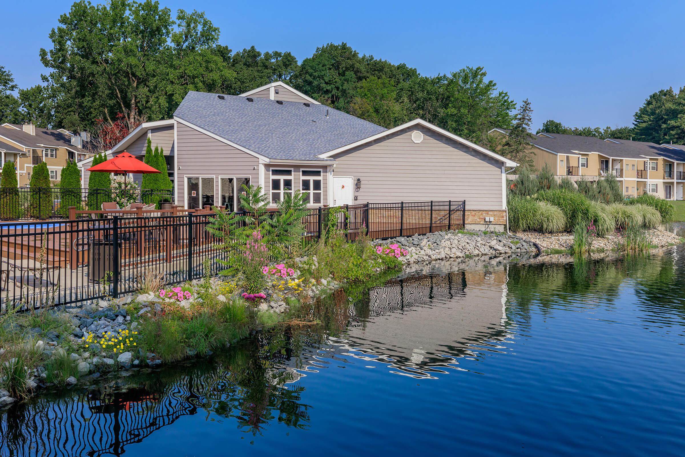 a small house surrounded by water