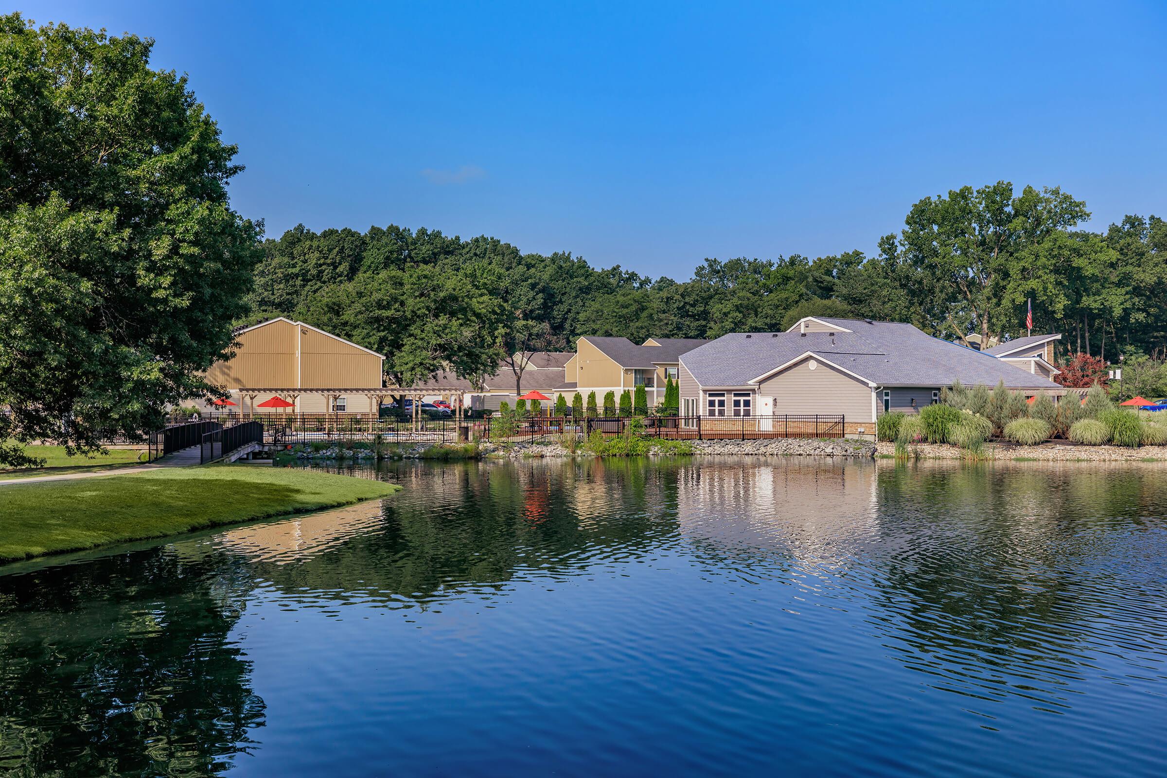 a small house surrounded by water