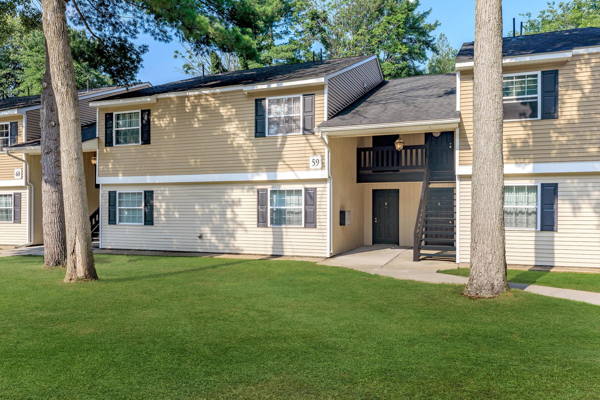 a large lawn in front of a house