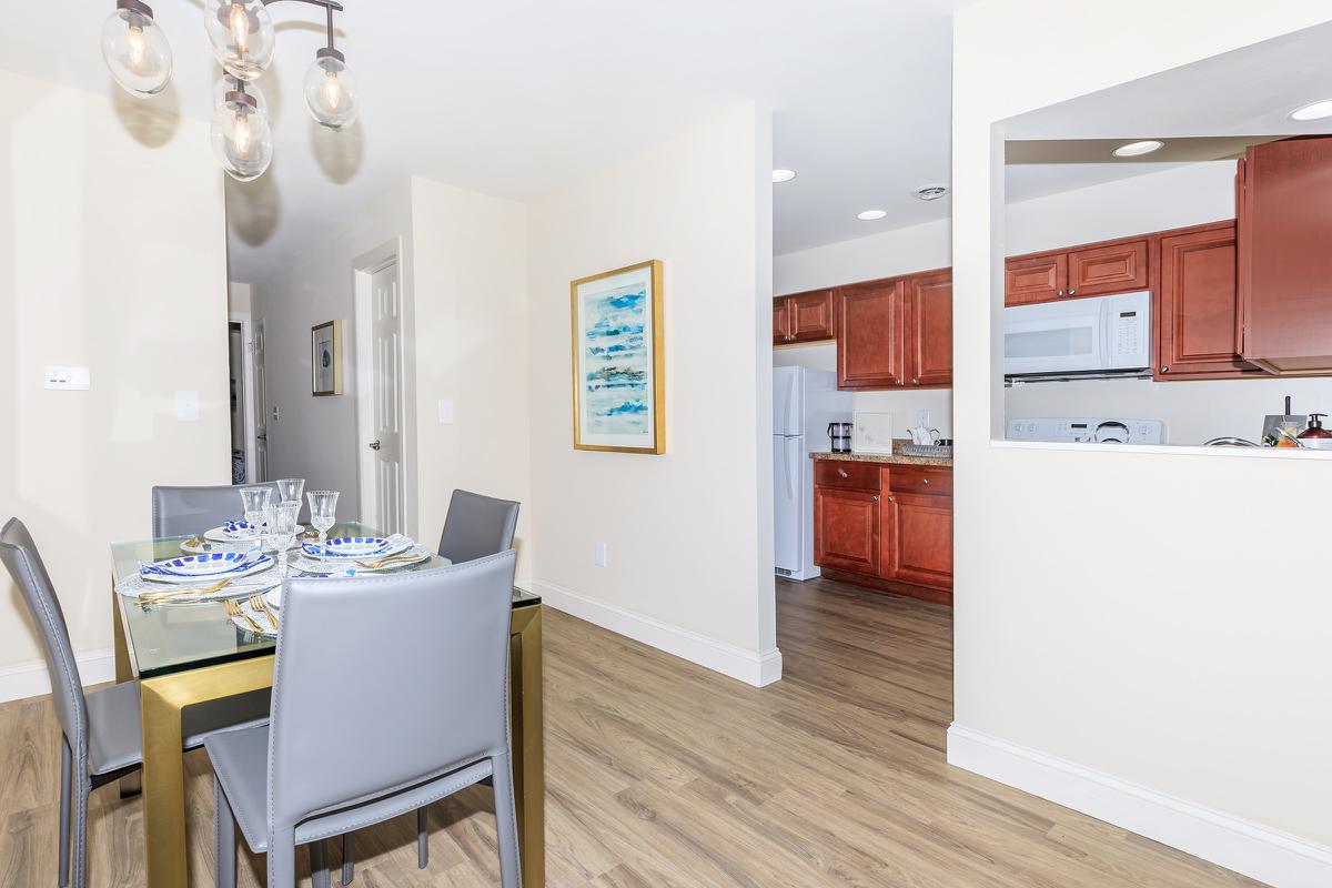 a kitchen with a sink and a refrigerator