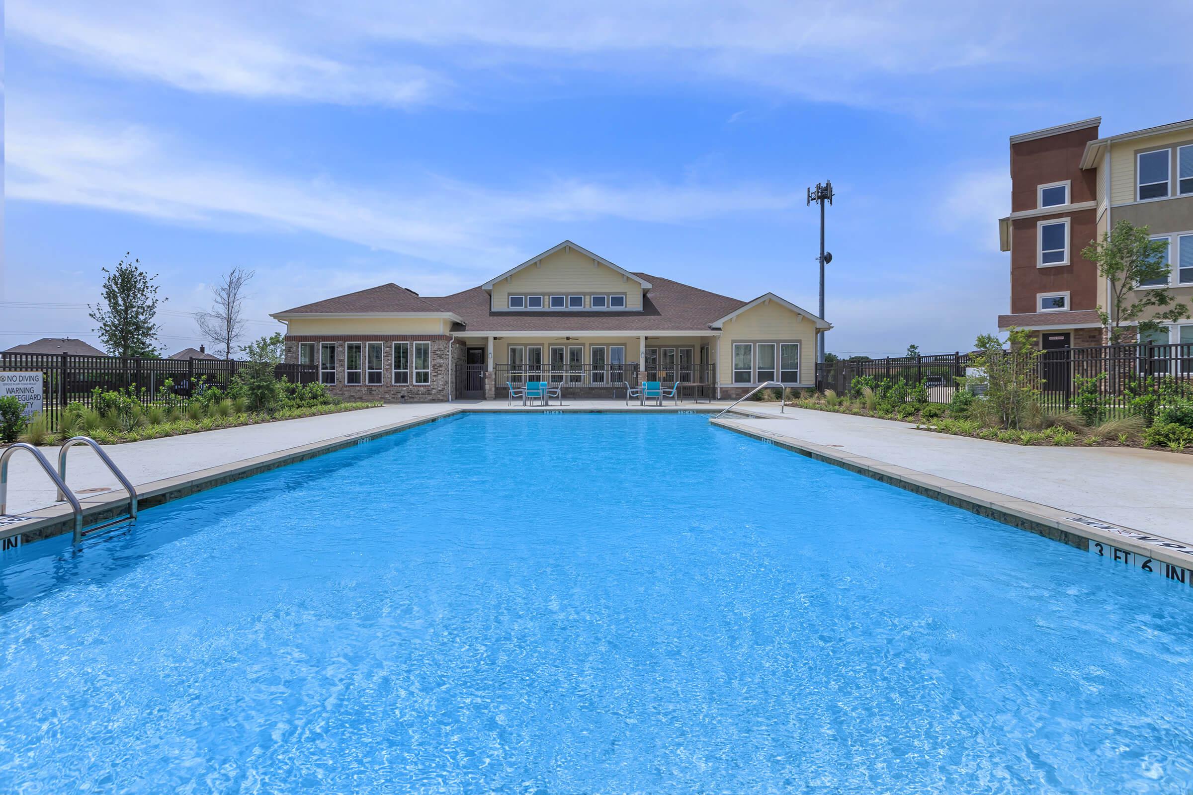 a pool next to a body of water