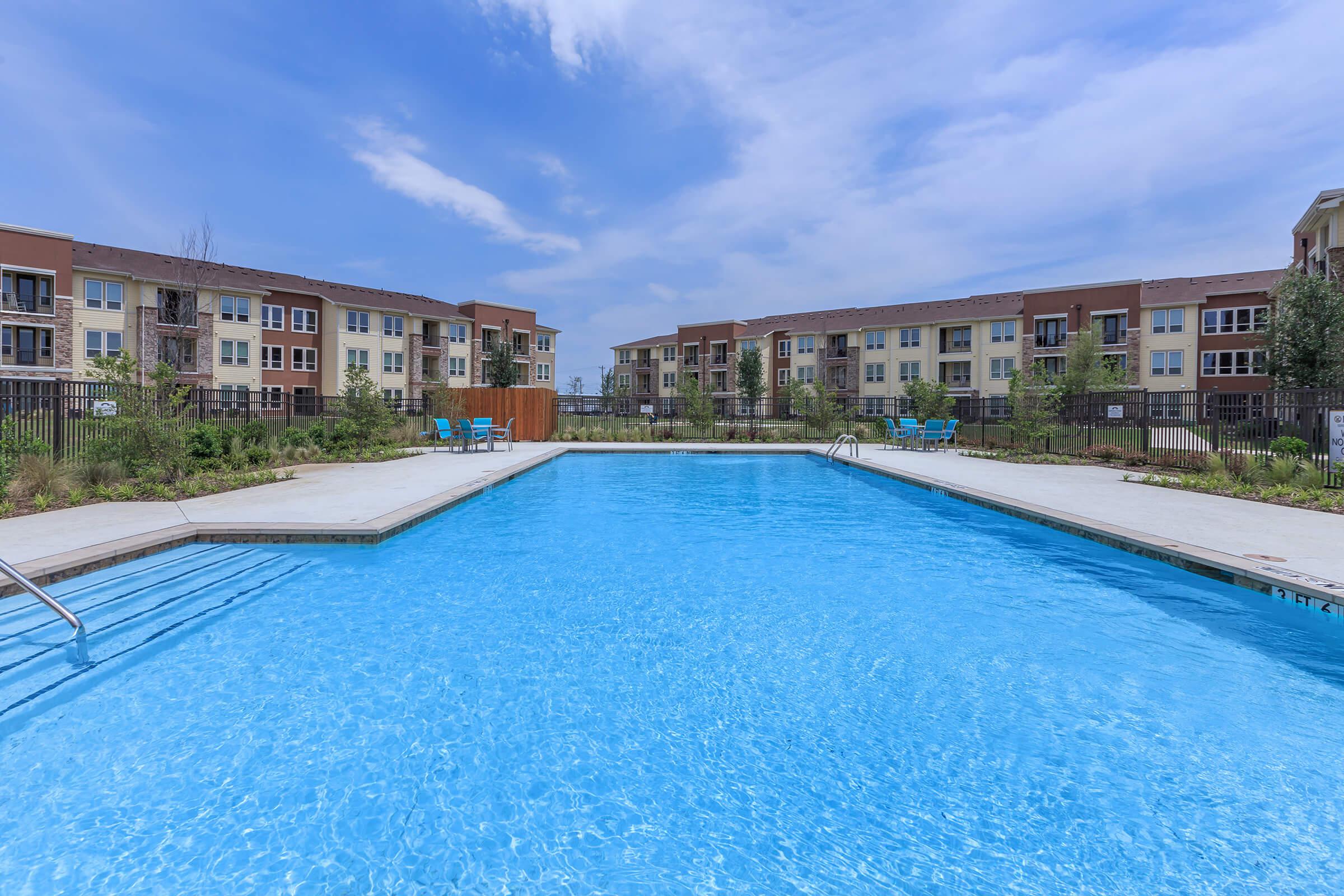 a pool next to a body of water