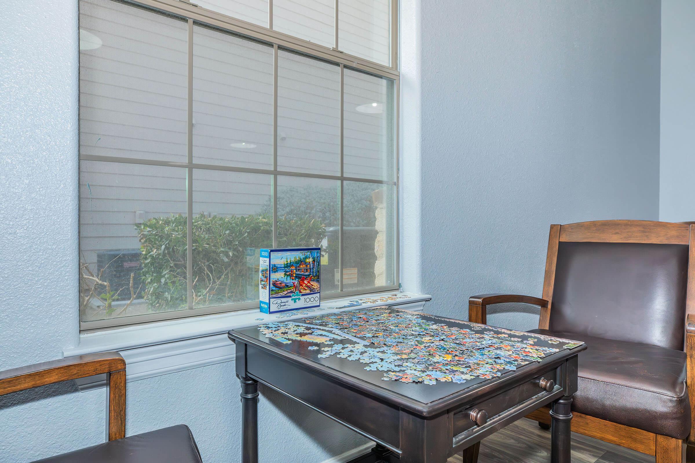 a room filled with furniture and a window