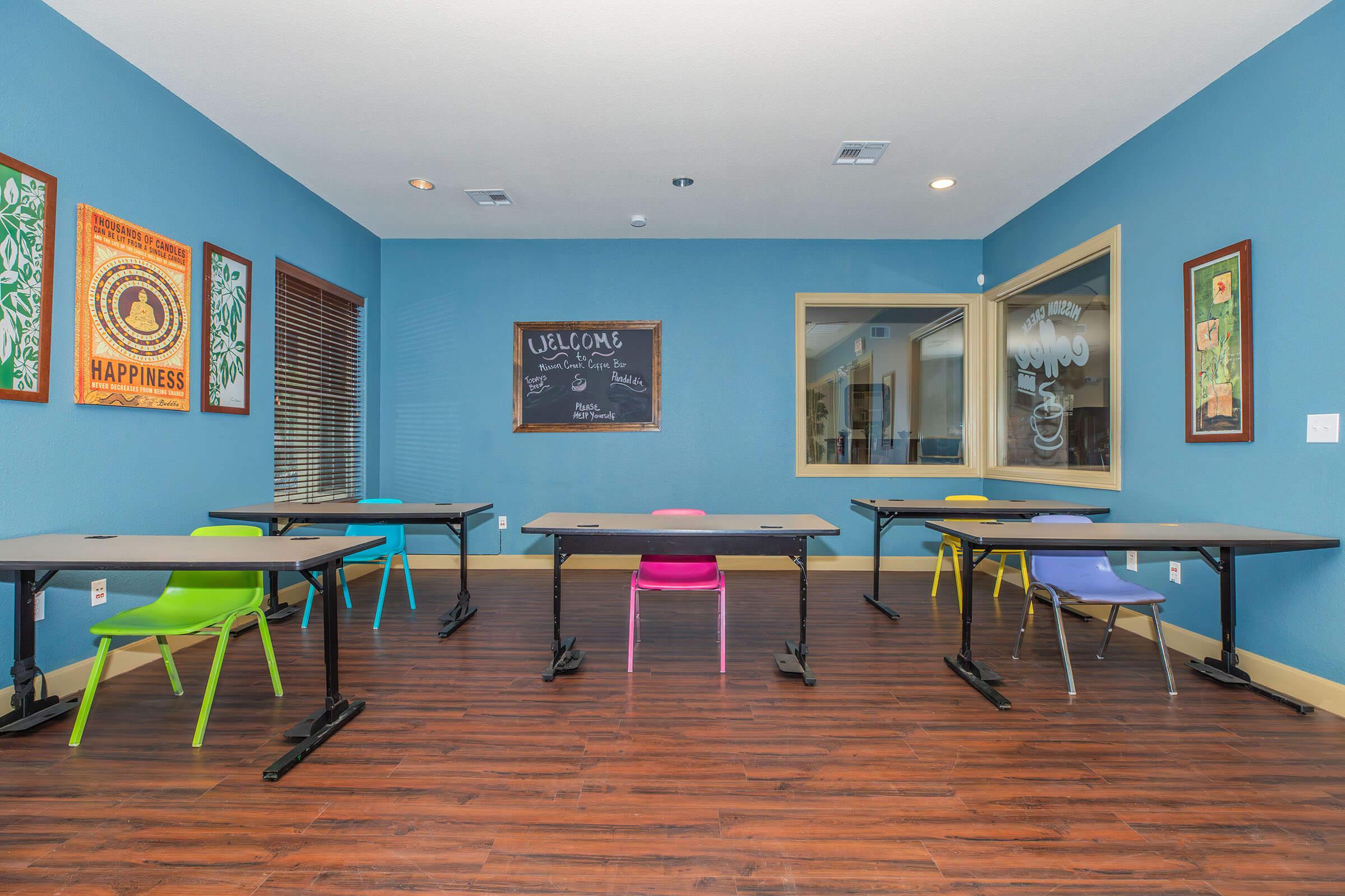 a living room with a pool table