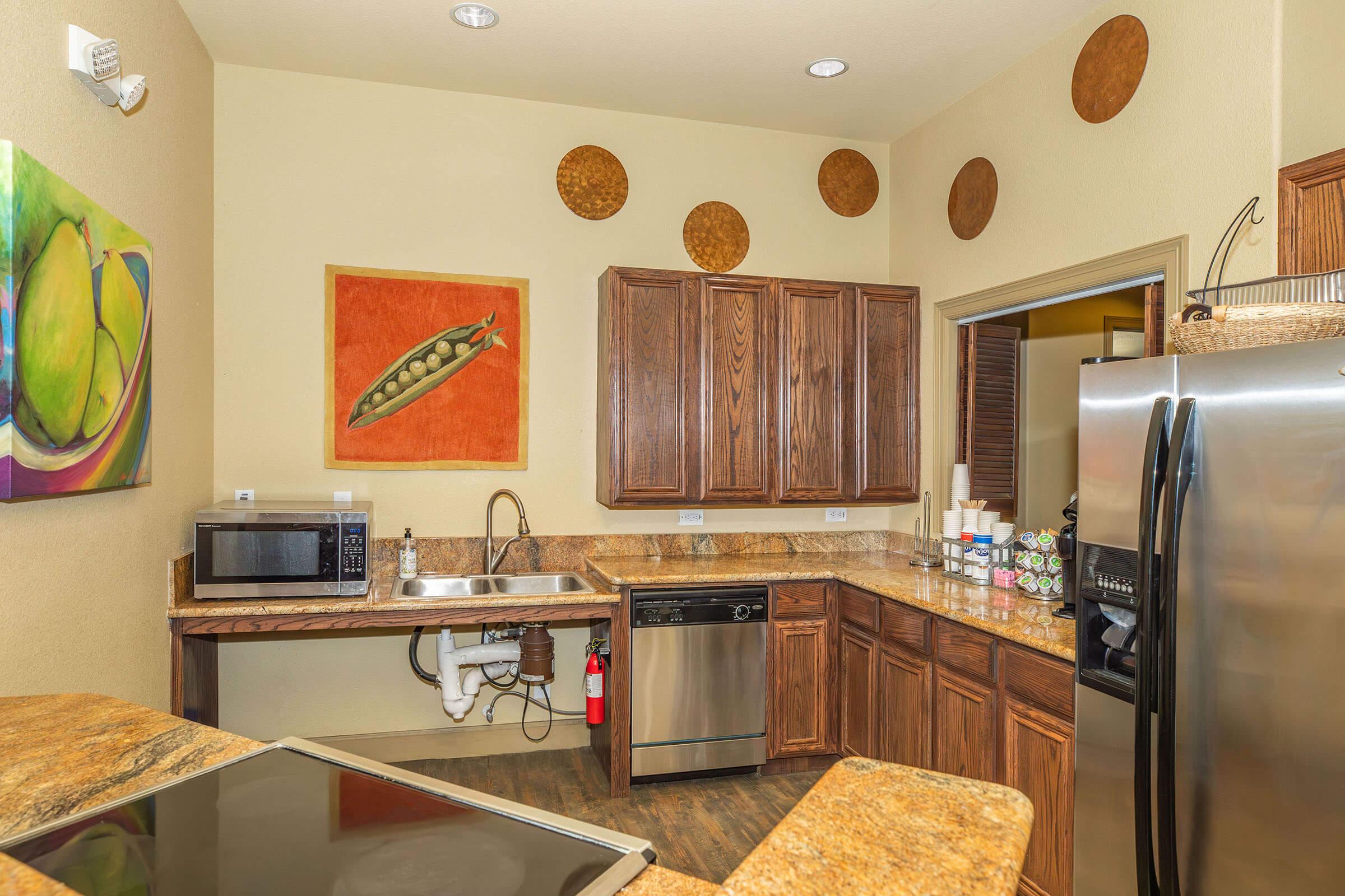 a kitchen with a table in a room