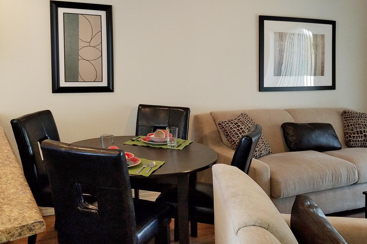a living room with a leather chair