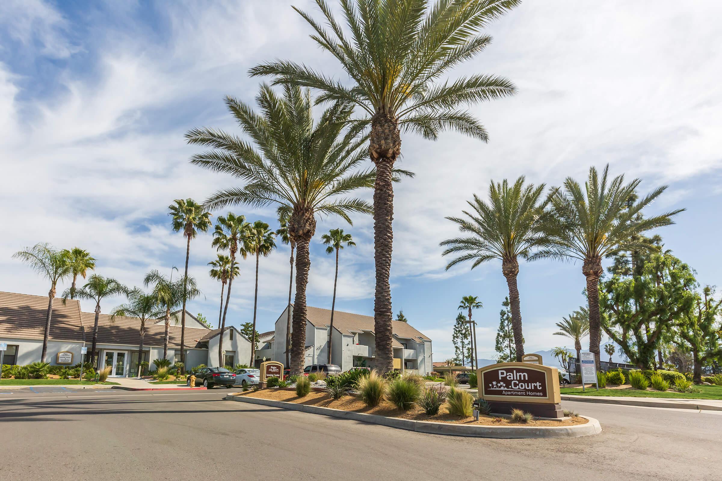 Palm Court Apartment Homes monument sign