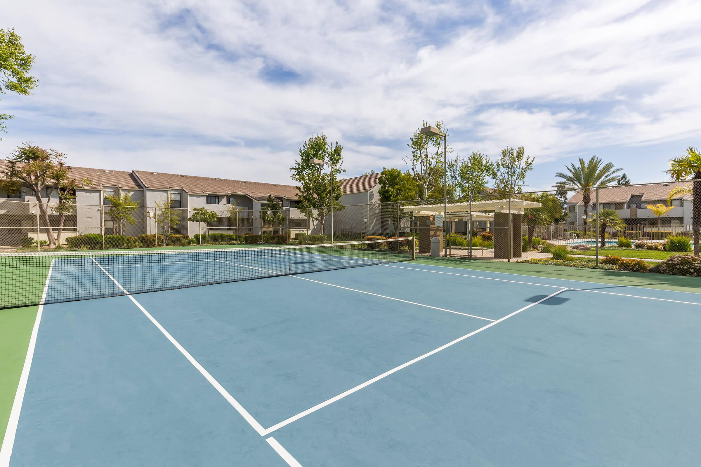 Palm Court Apartment Homes tennis court