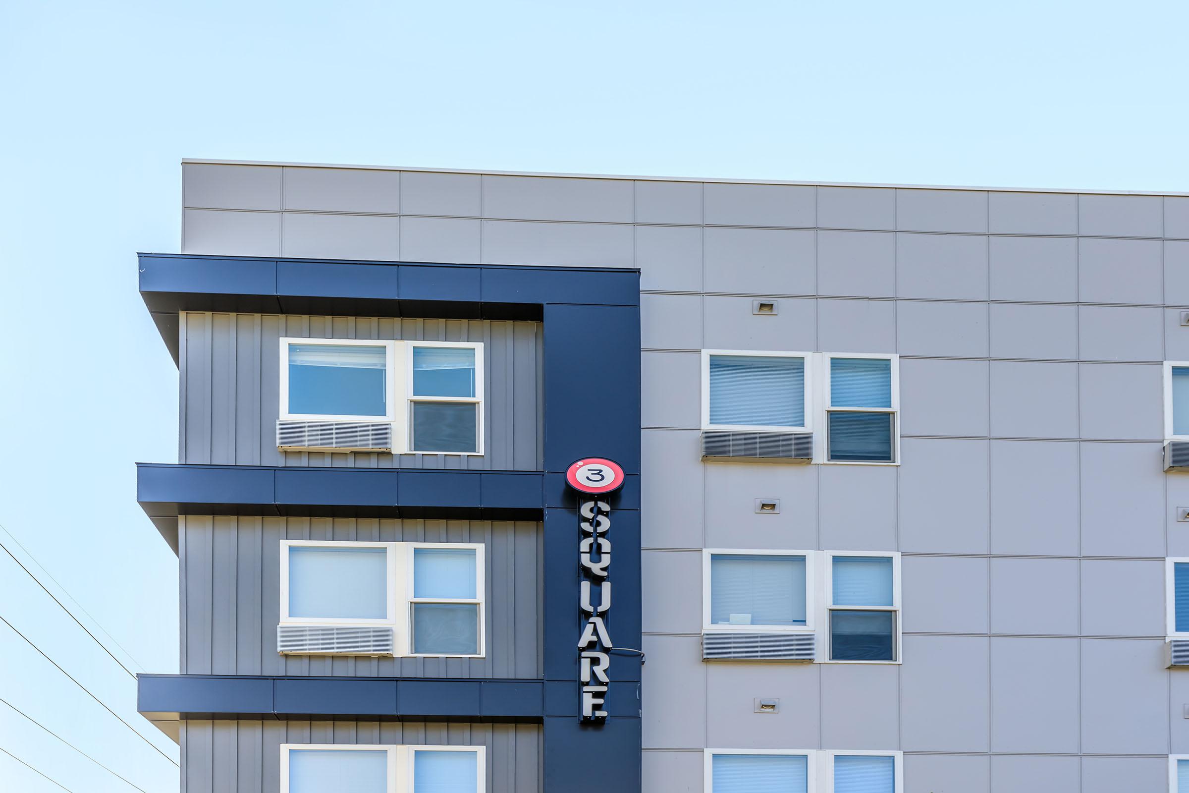 a person standing in front of a building