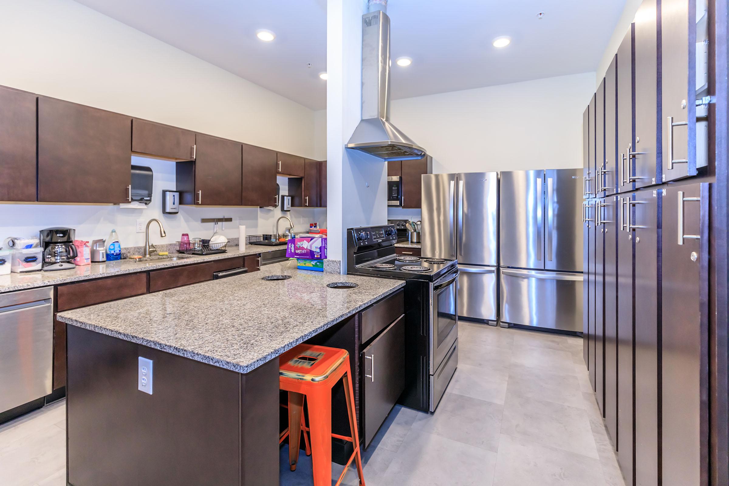 a modern kitchen with stainless steel appliances