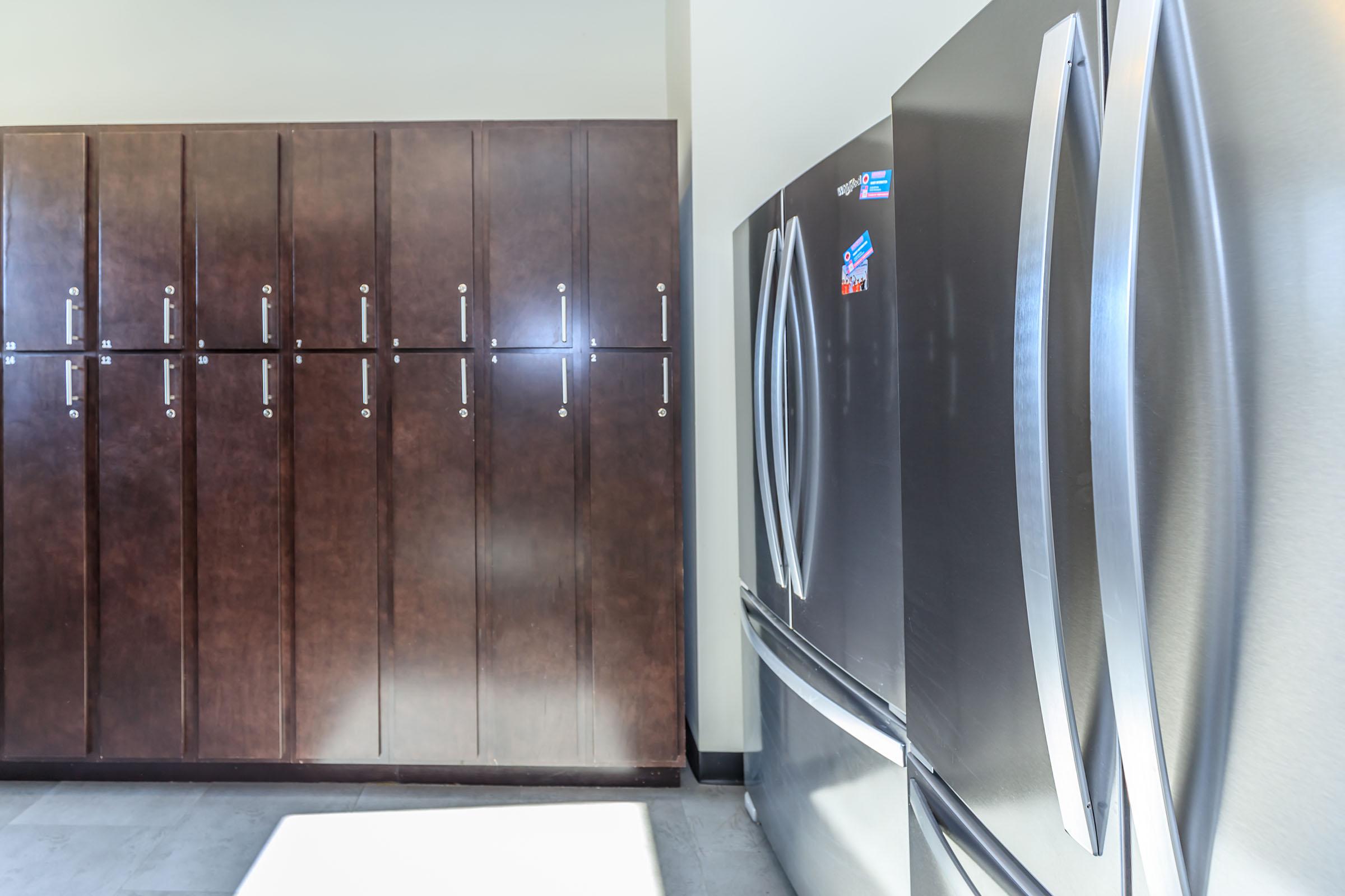 a stainless steel refrigerator in a kitchen