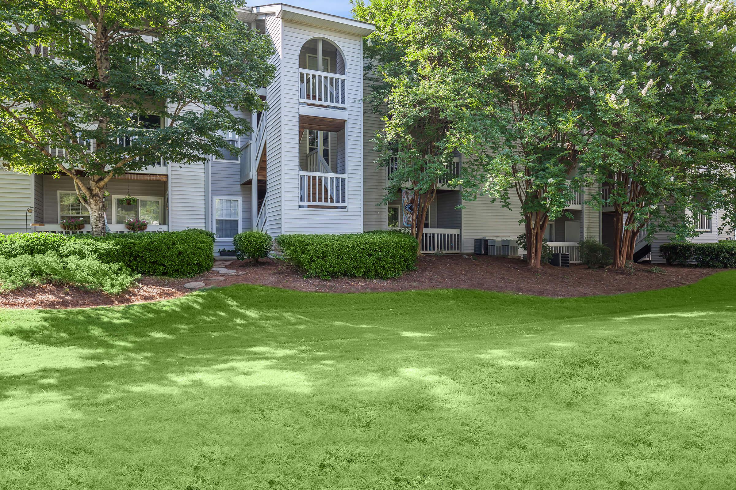 a large lawn in front of a house