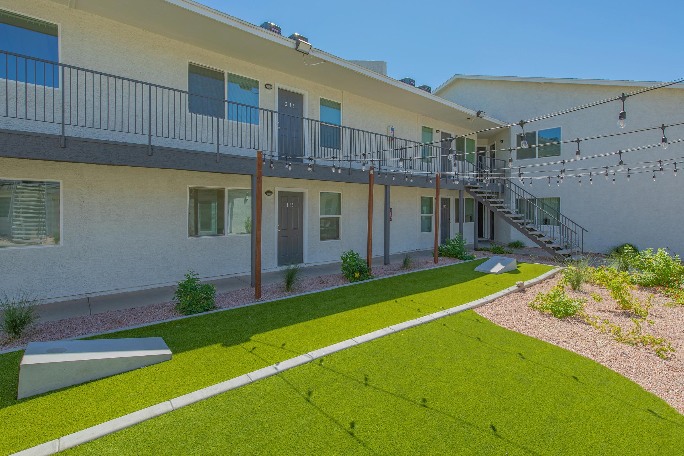 a large lawn in front of a building