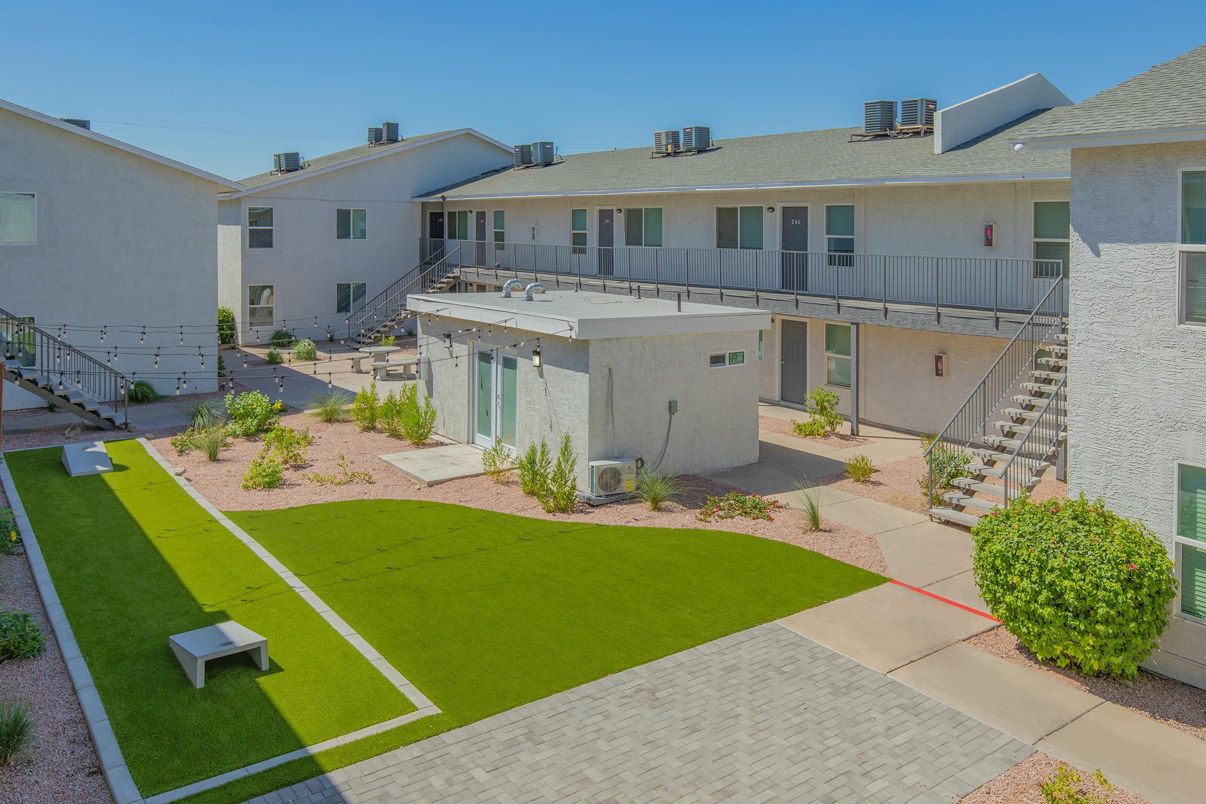 a large lawn in front of a house