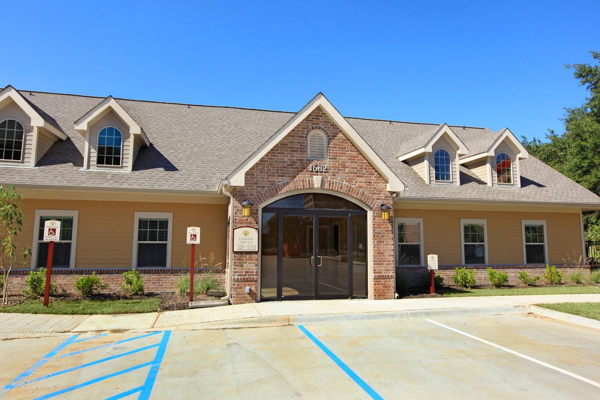 a small house in front of a building