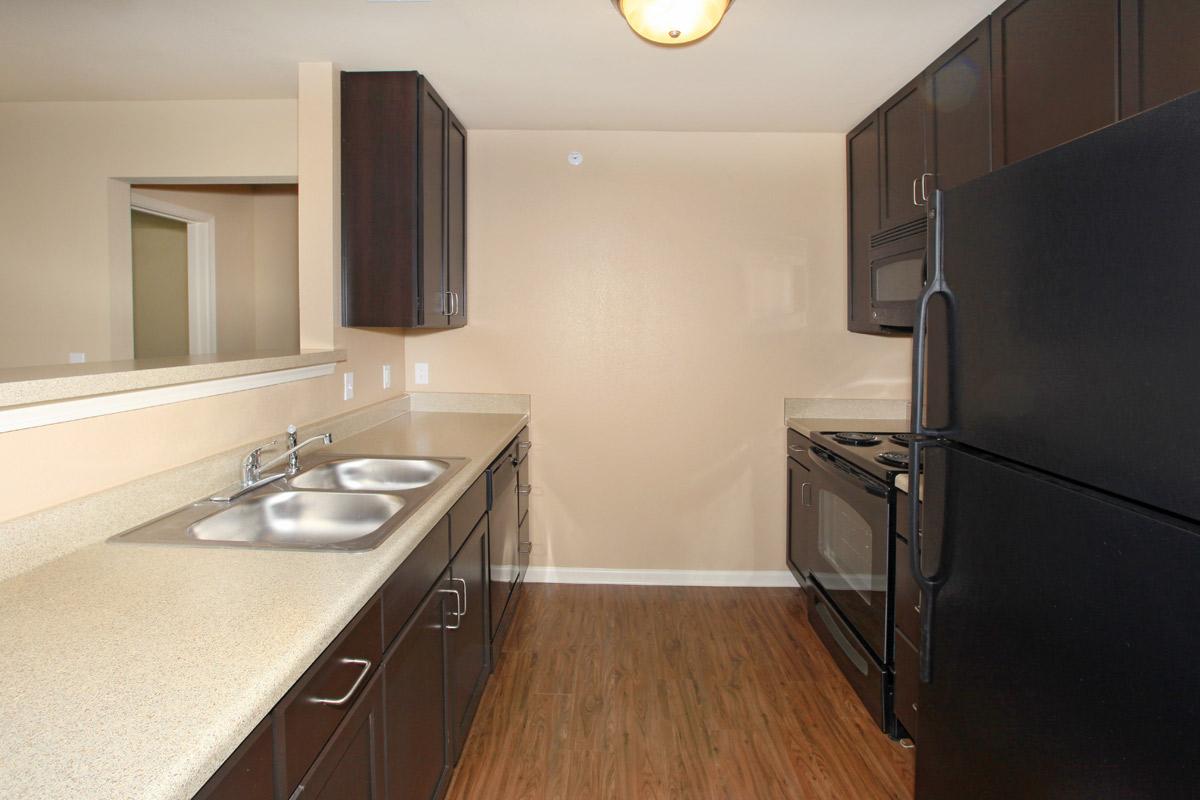 a modern kitchen with stainless steel appliances