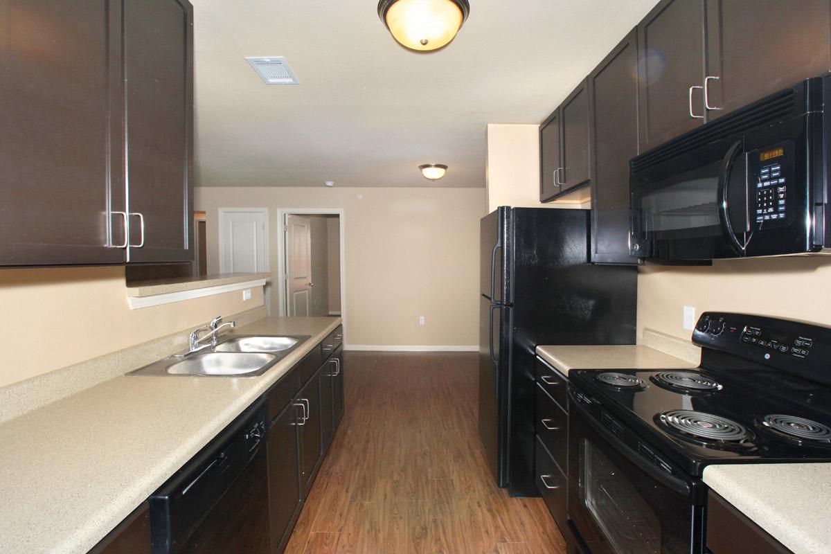 a modern kitchen with stainless steel appliances