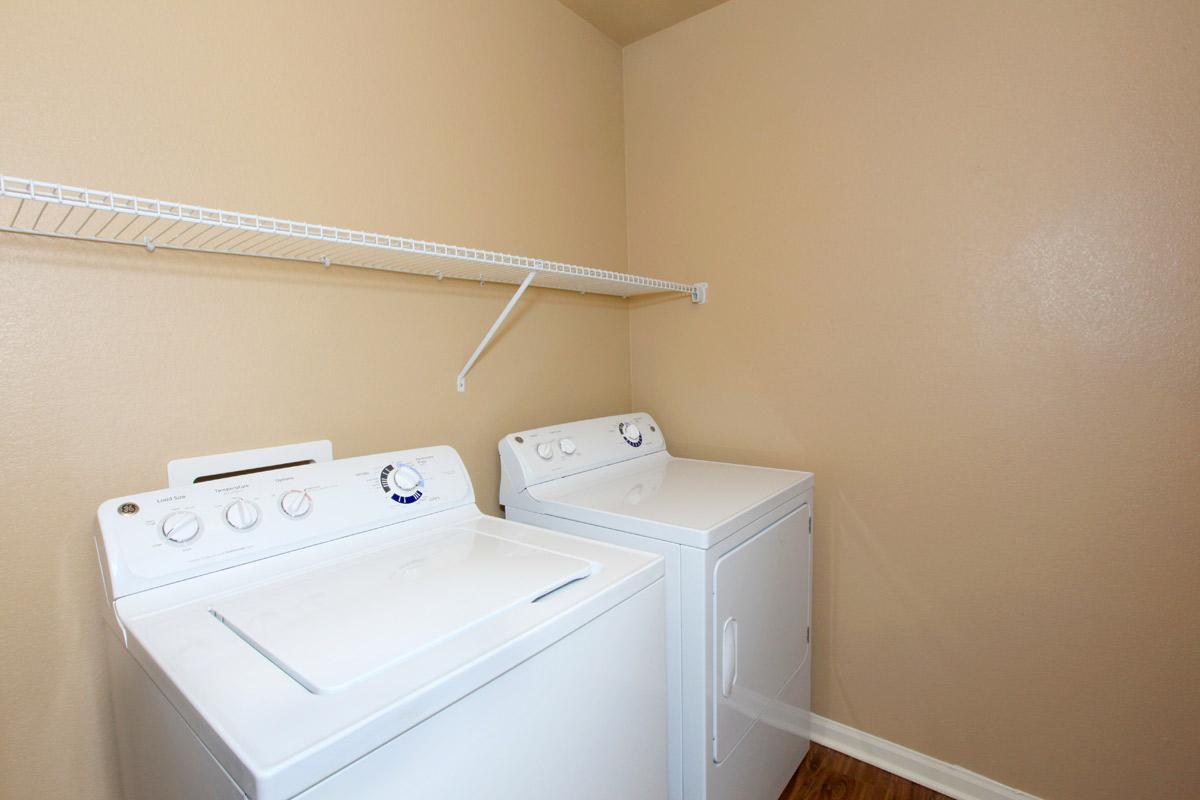 a white refrigerator freezer sitting in a room