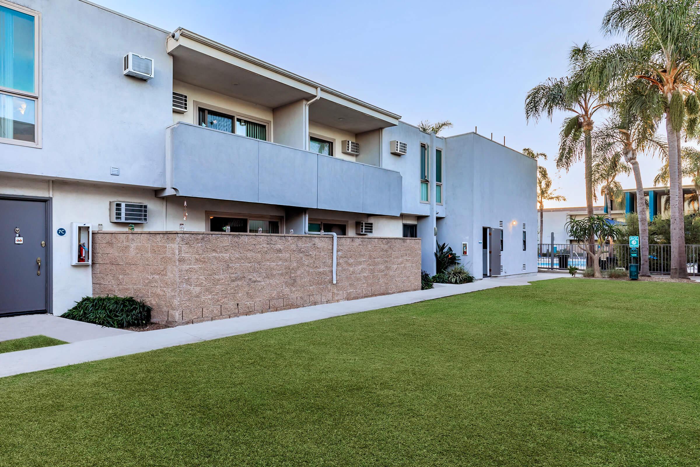 a large lawn in front of a house