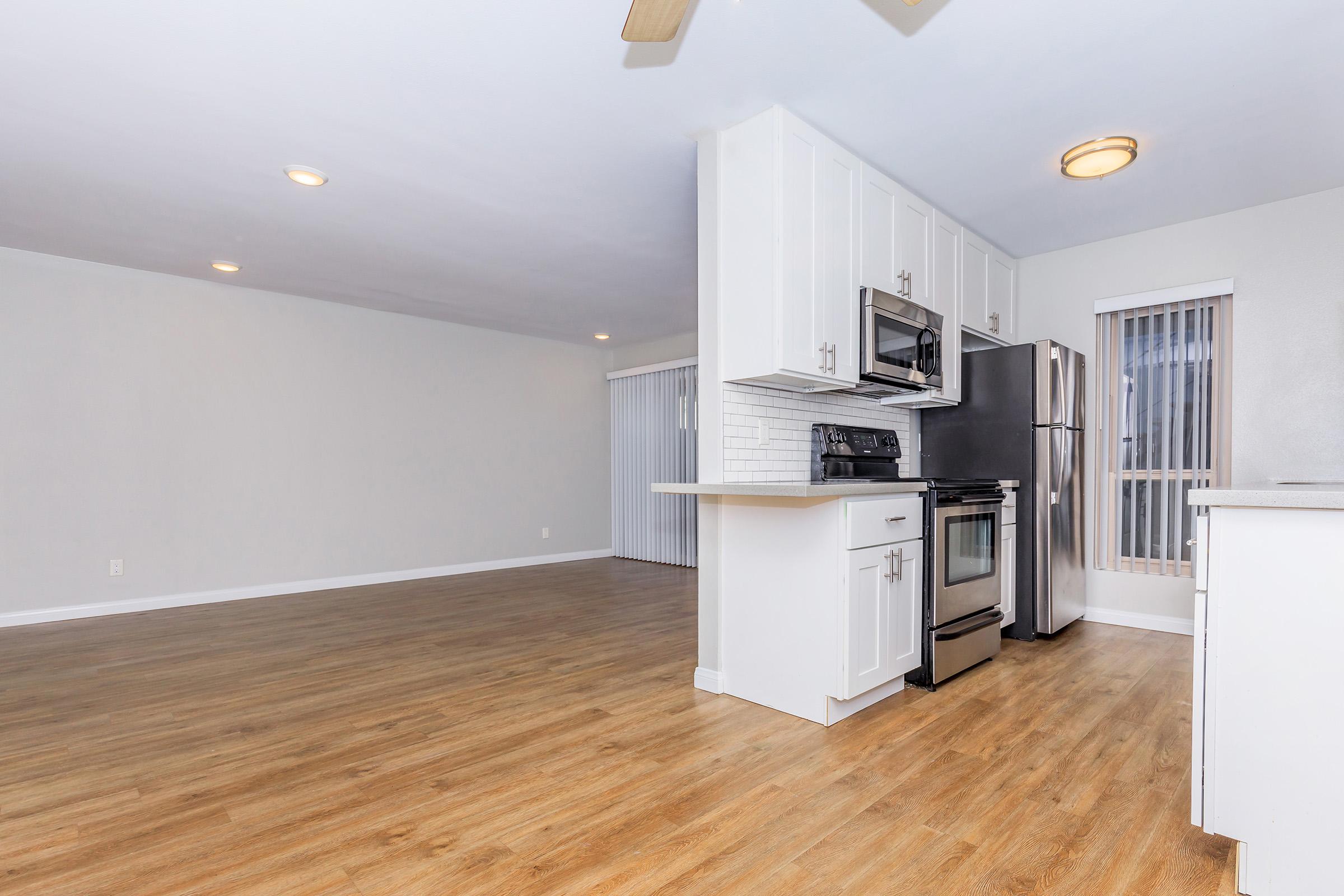 a stainless steel refrigerator in a kitchen