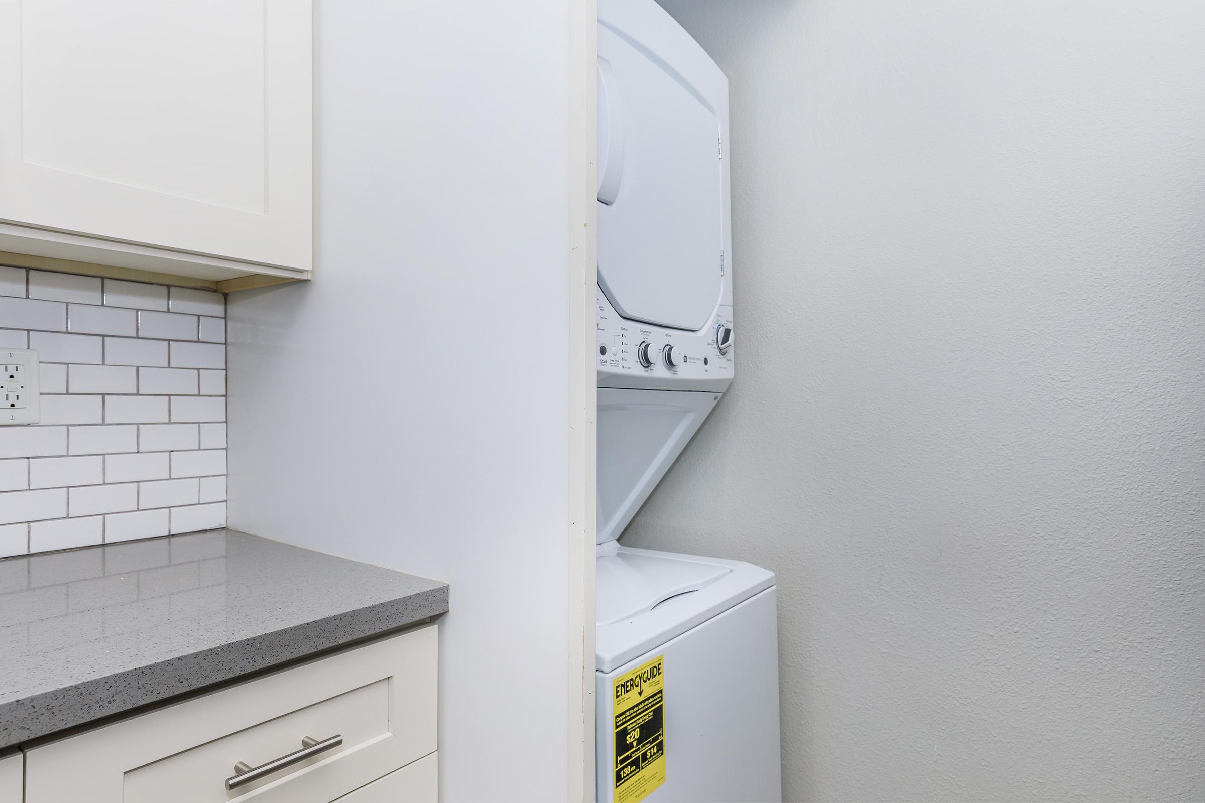 a stove top oven sitting inside of a refrigerator