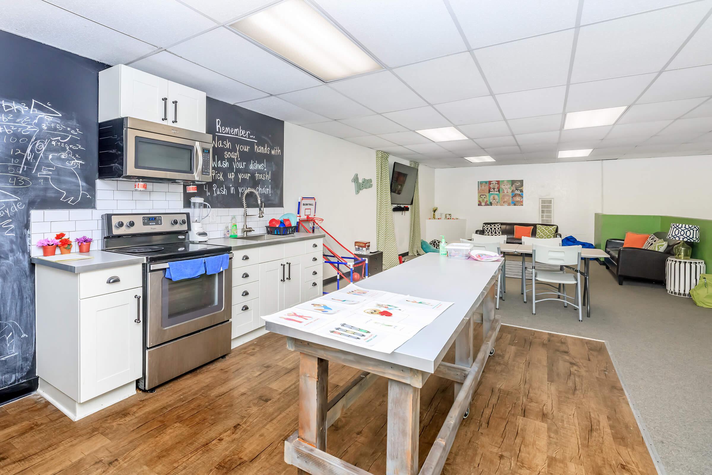 Community kitchen with stainless steel appliances