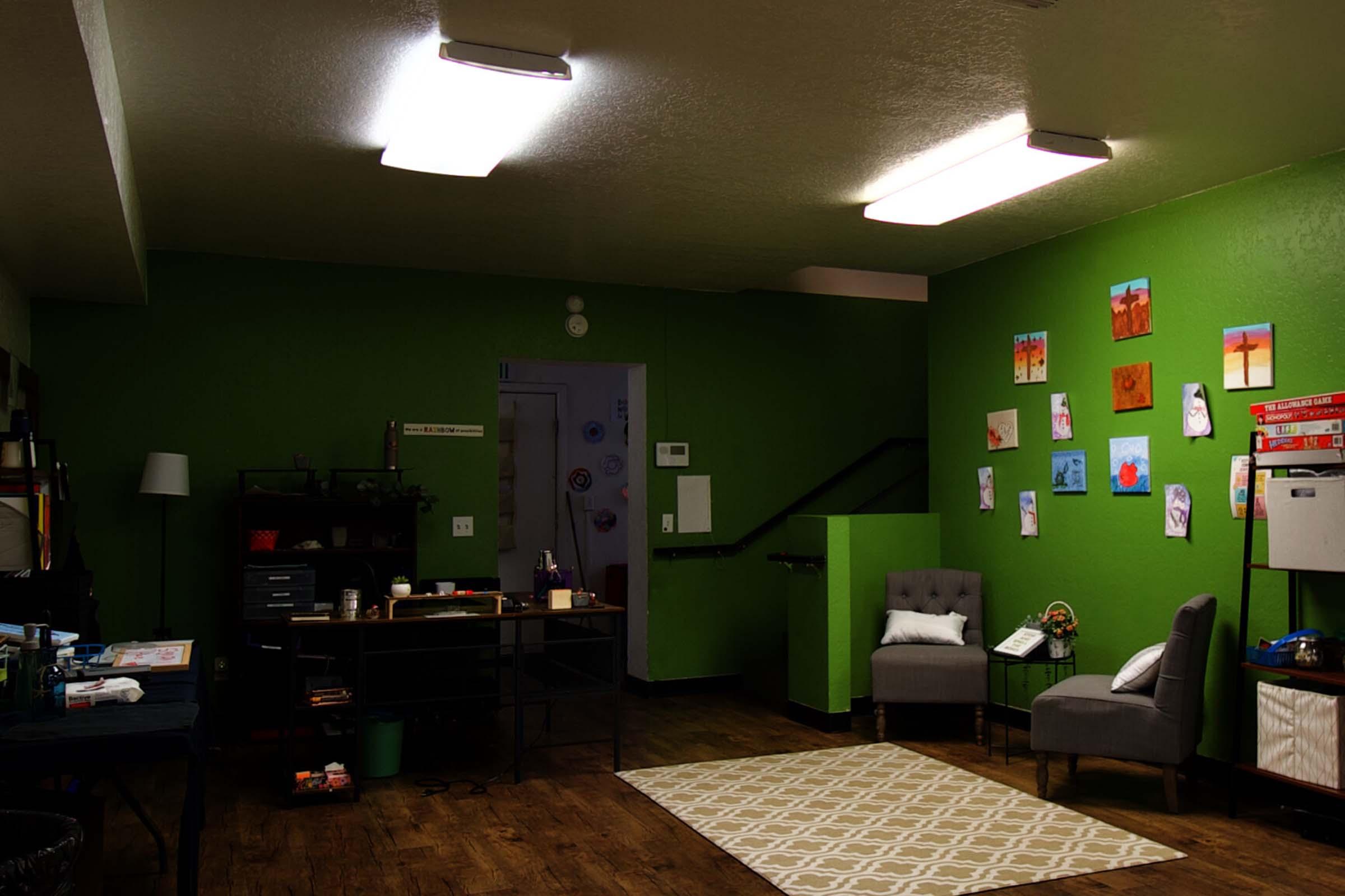 a room with a green light