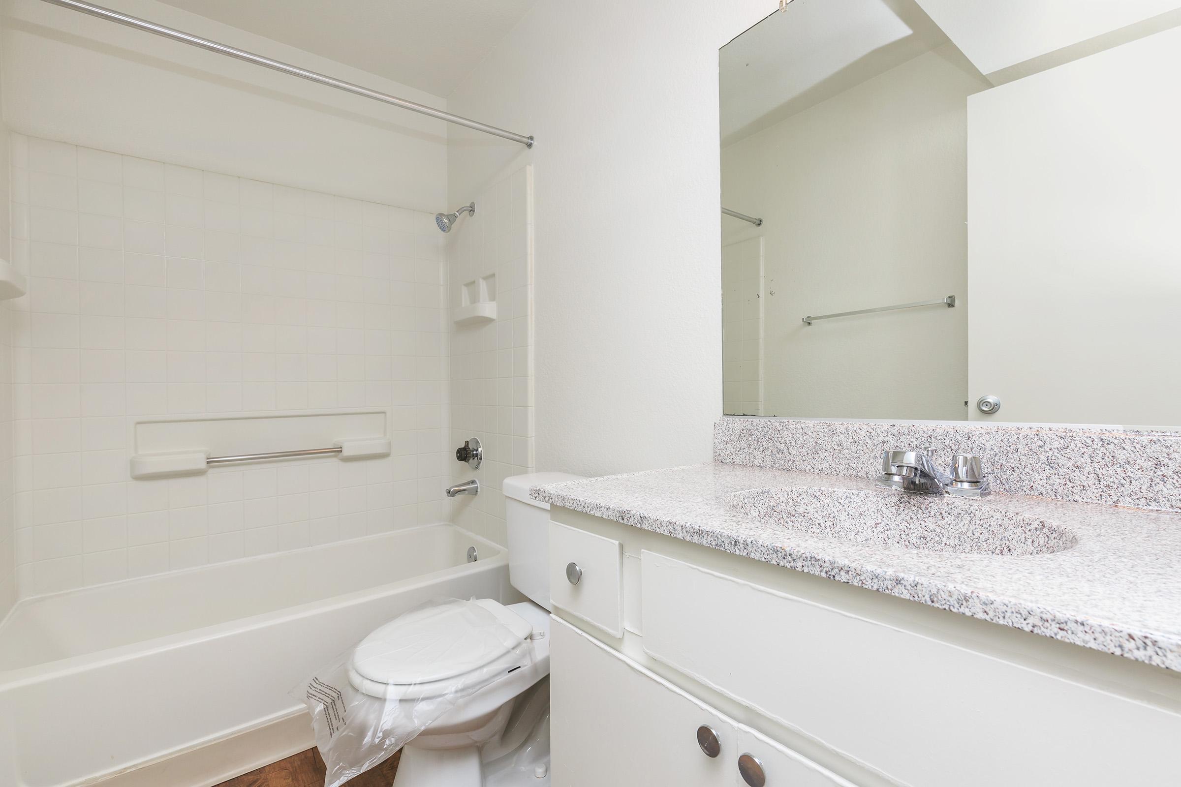 Bathroom with white cabinets