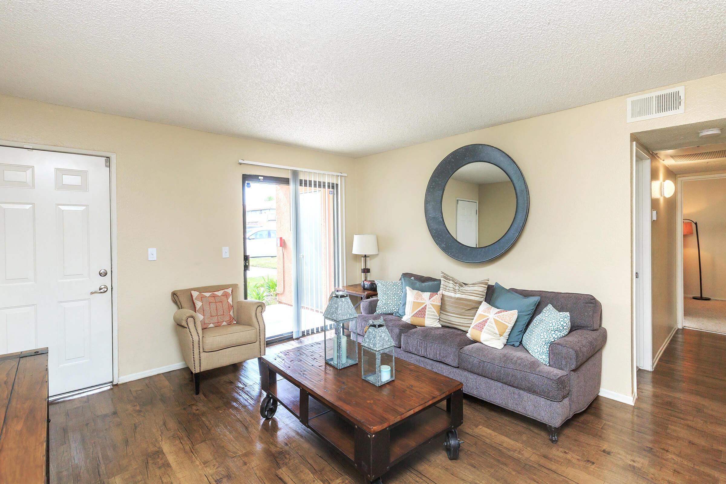 Furnished living room with sliding glass doors