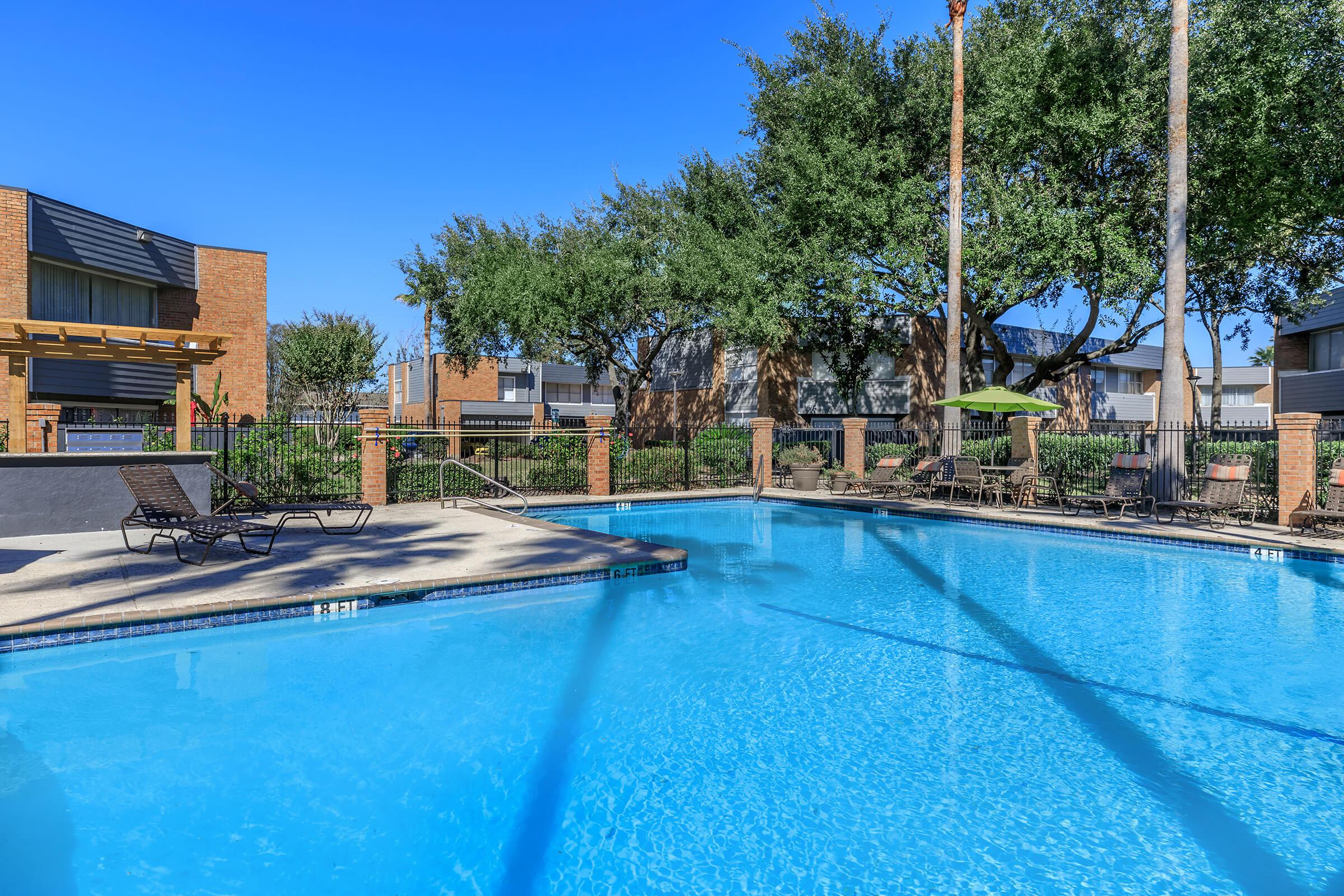 THE TOWNHOMES ON THREE HAS  A SPARKLING SWIMMING POOL