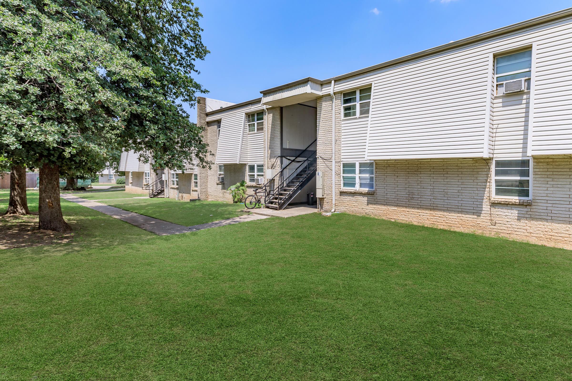 a large lawn in front of a house