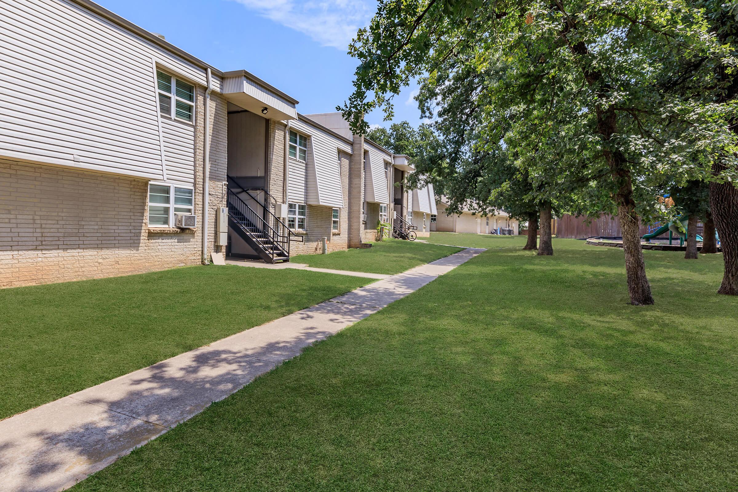 a large lawn in front of a house