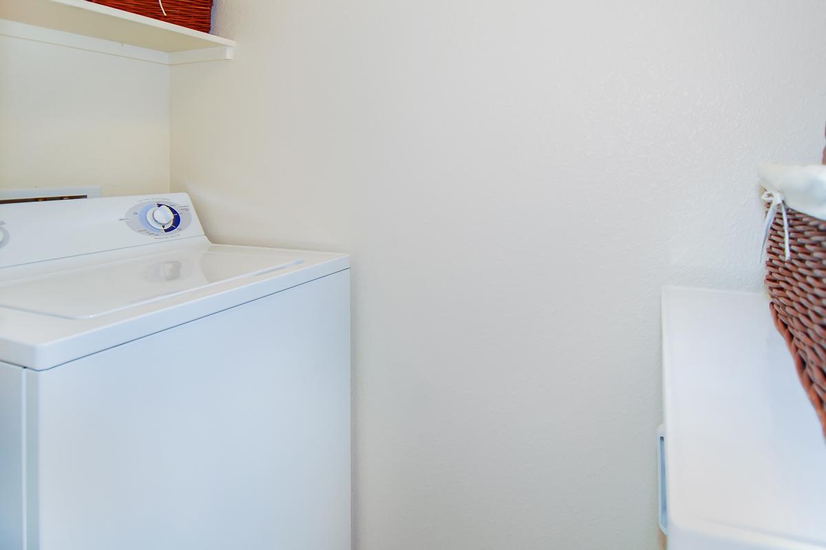 a white refrigerator freezer sitting in a box