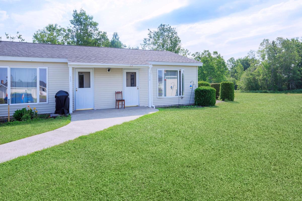 a large lawn in front of a house