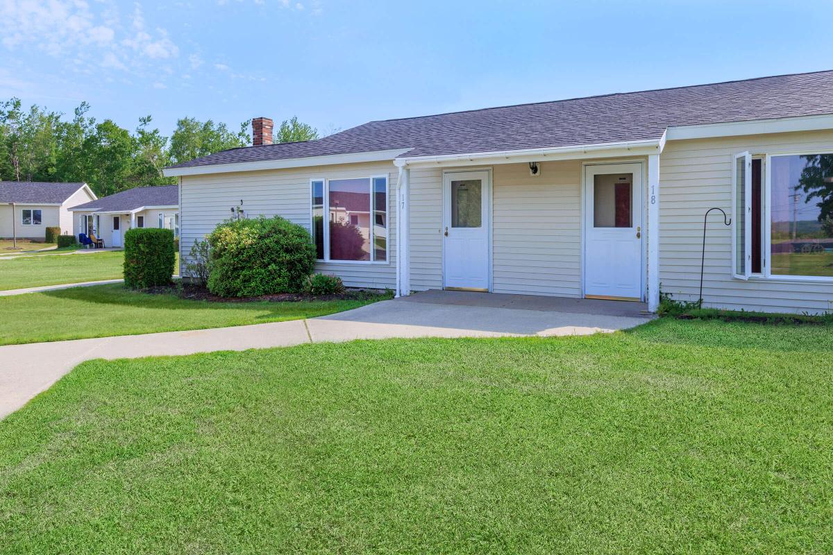 a large lawn in front of a house