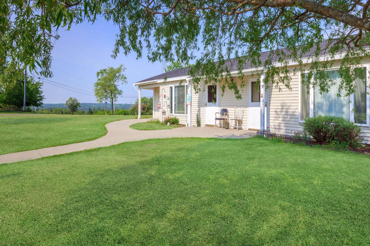 a large lawn in front of a house