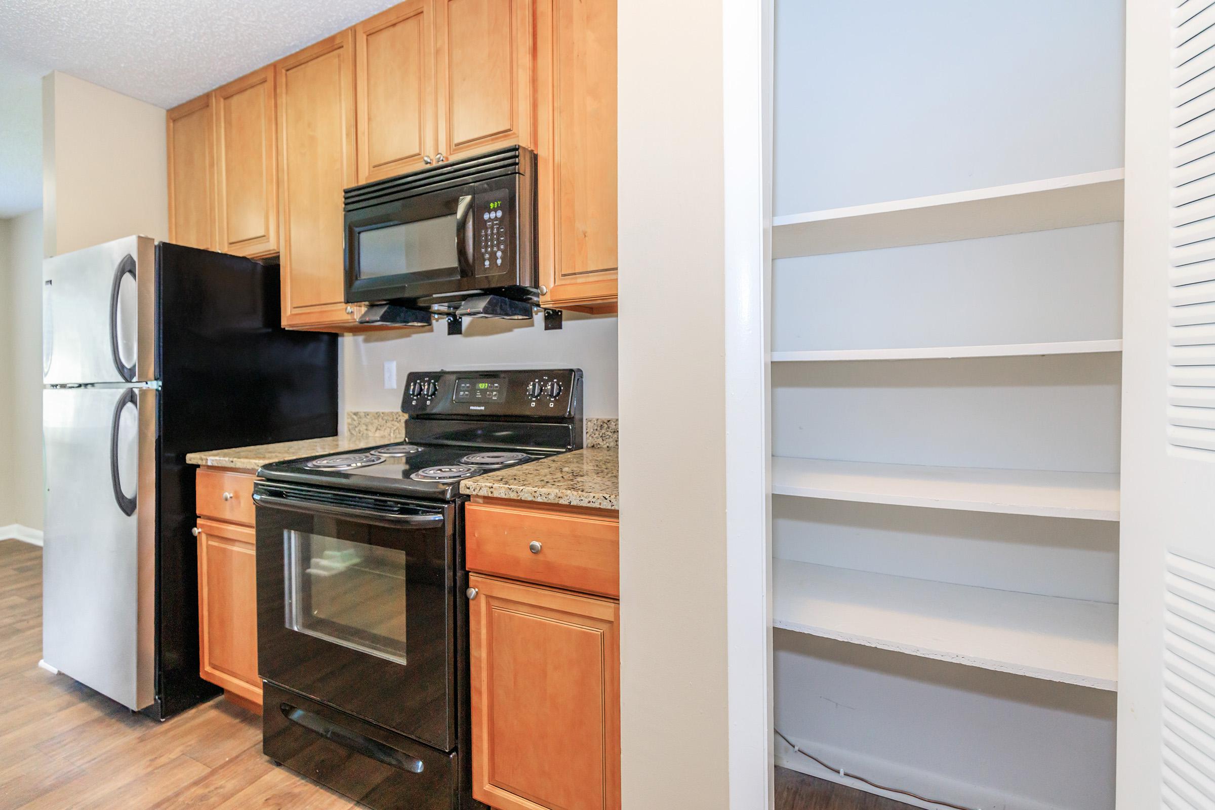 All electric kitchen with a pantry