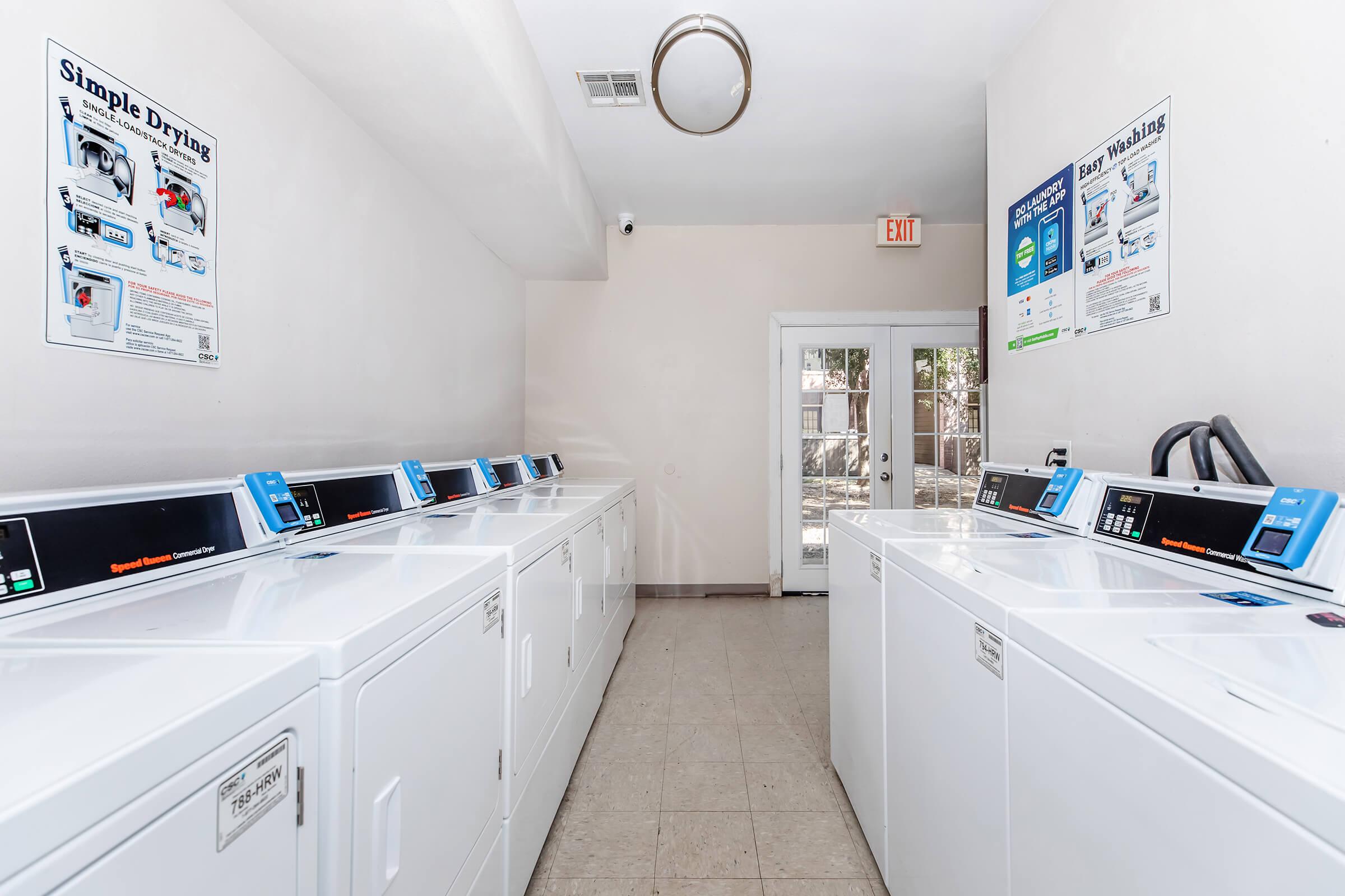 a kitchen with a sink and a refrigerator