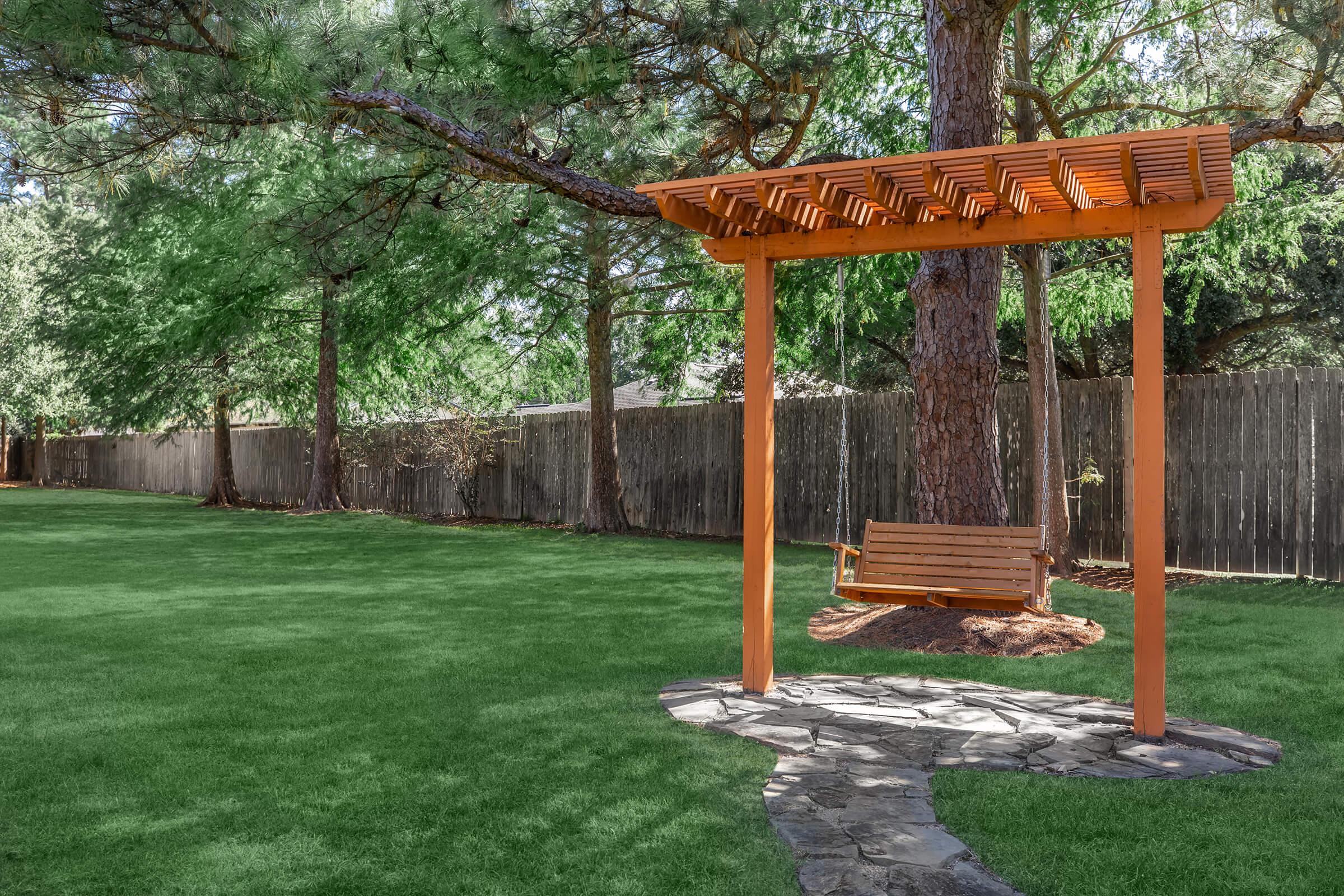 a wooden bench in a park