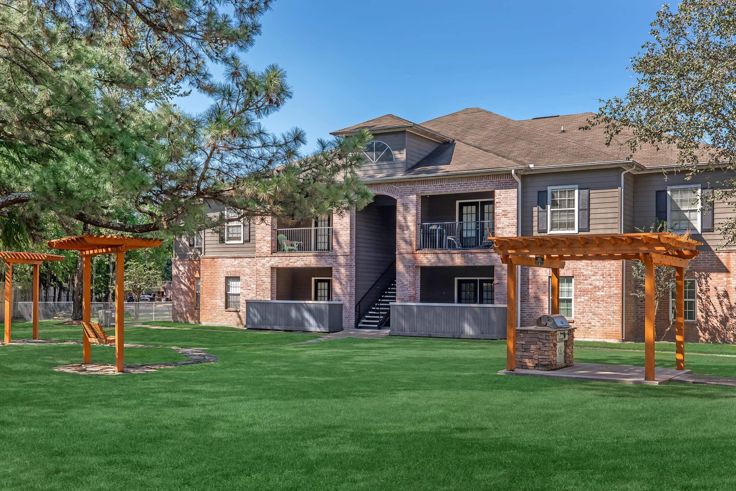 a large lawn in front of a house