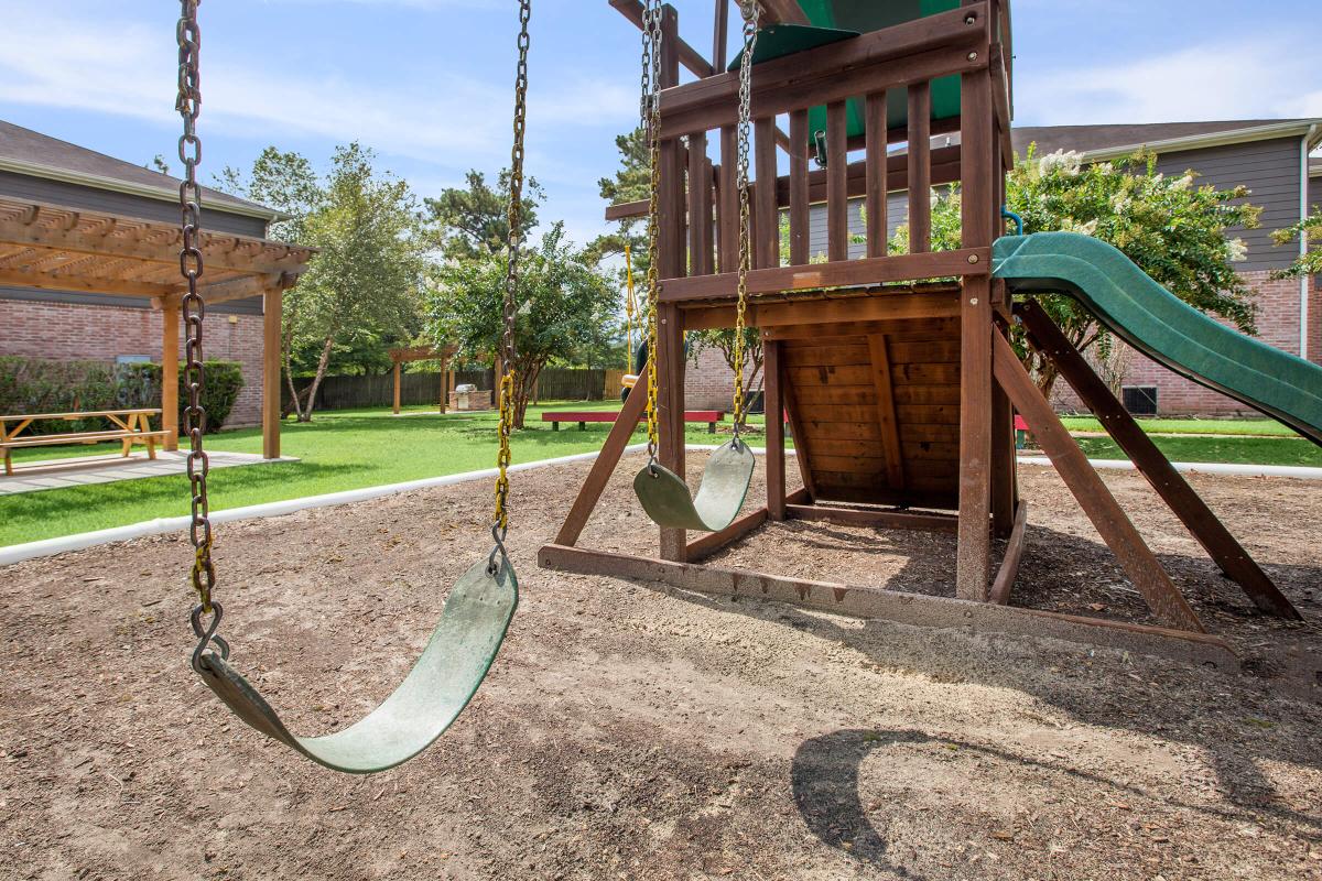 a swing set in a park