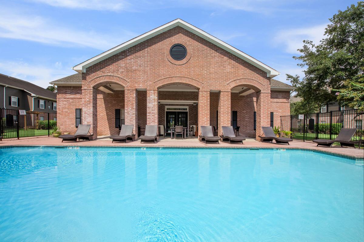 a large pool of water in front of a building