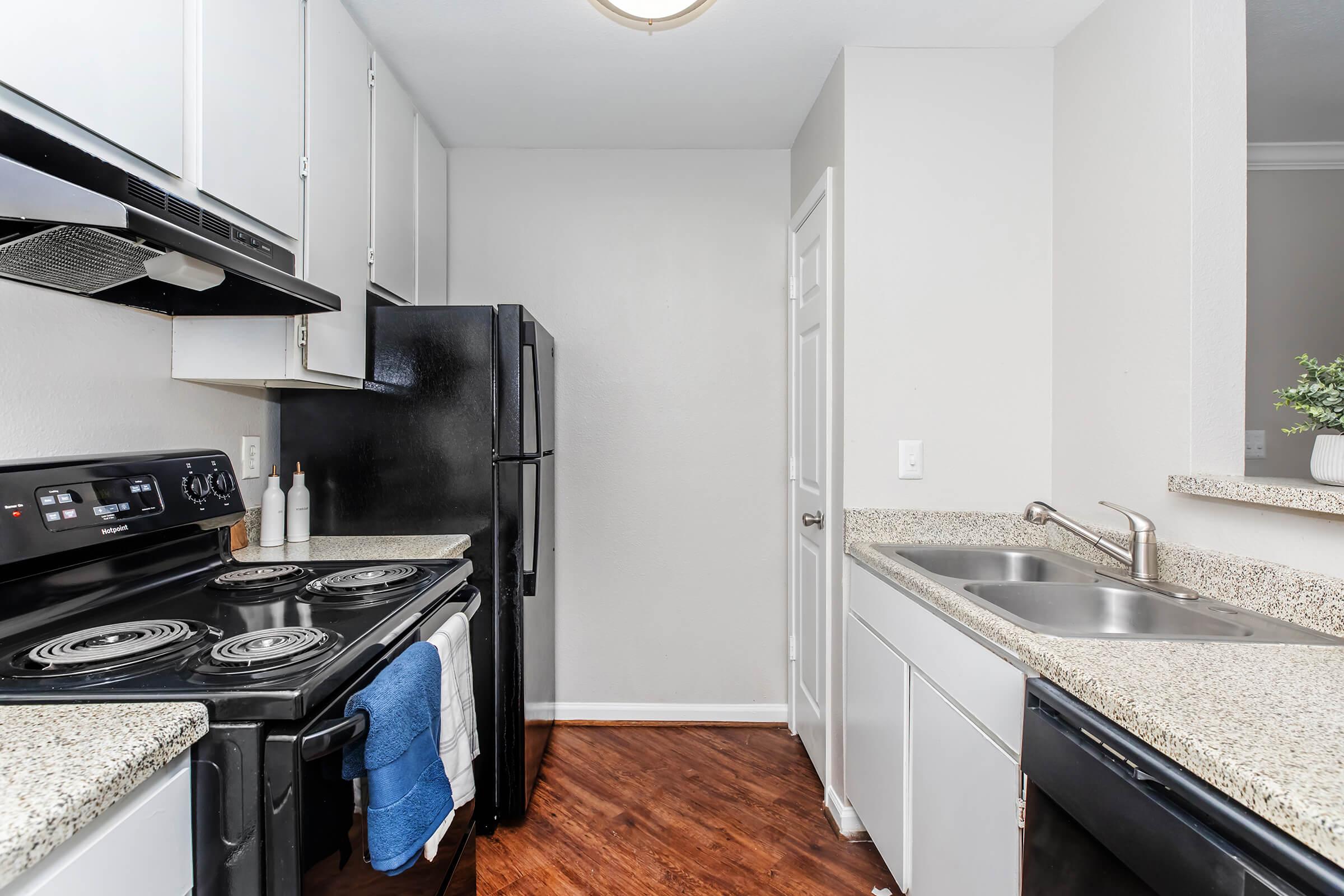 a modern kitchen with stainless steel appliances