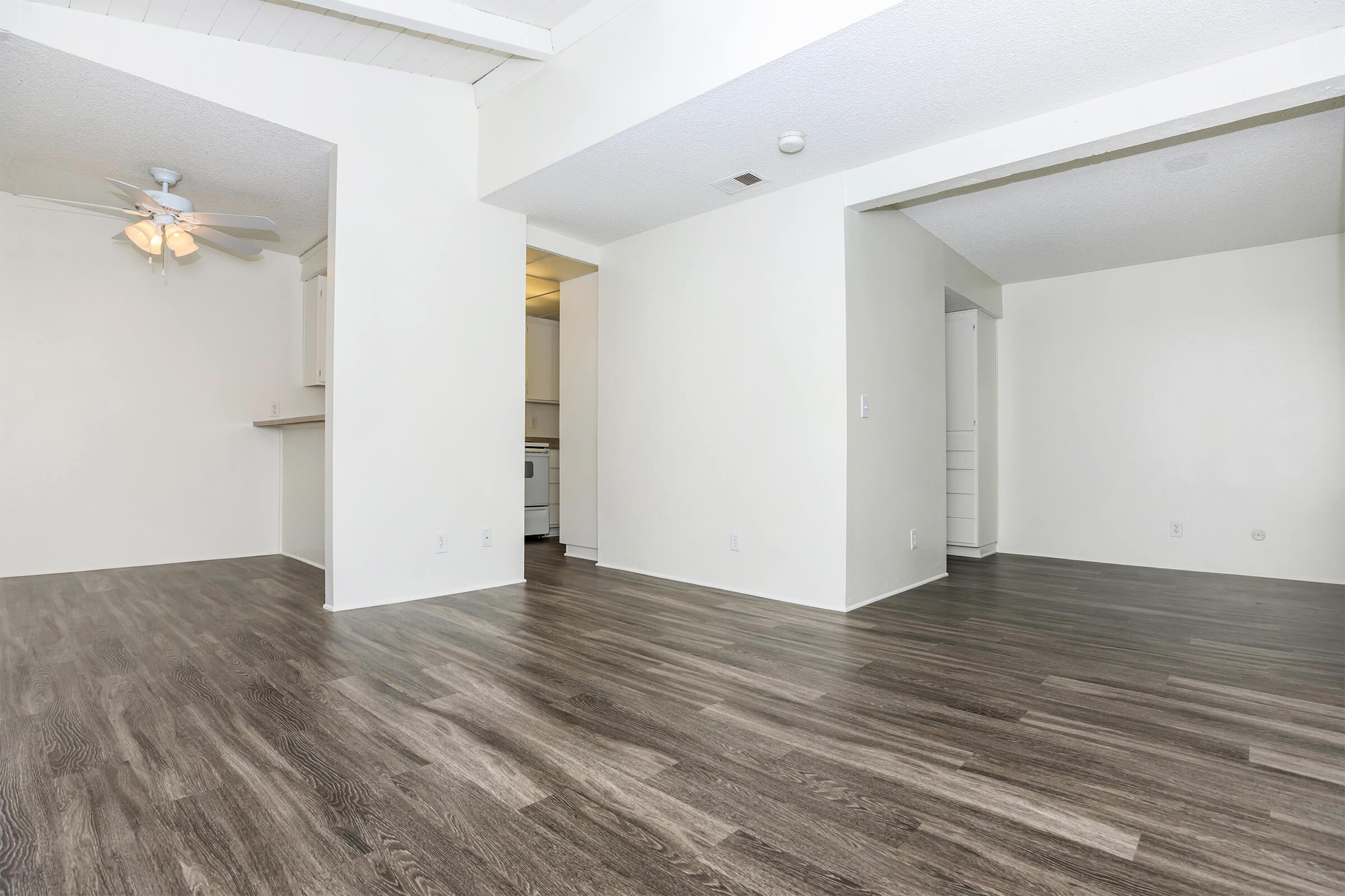 Living room and dining room with wooden floors