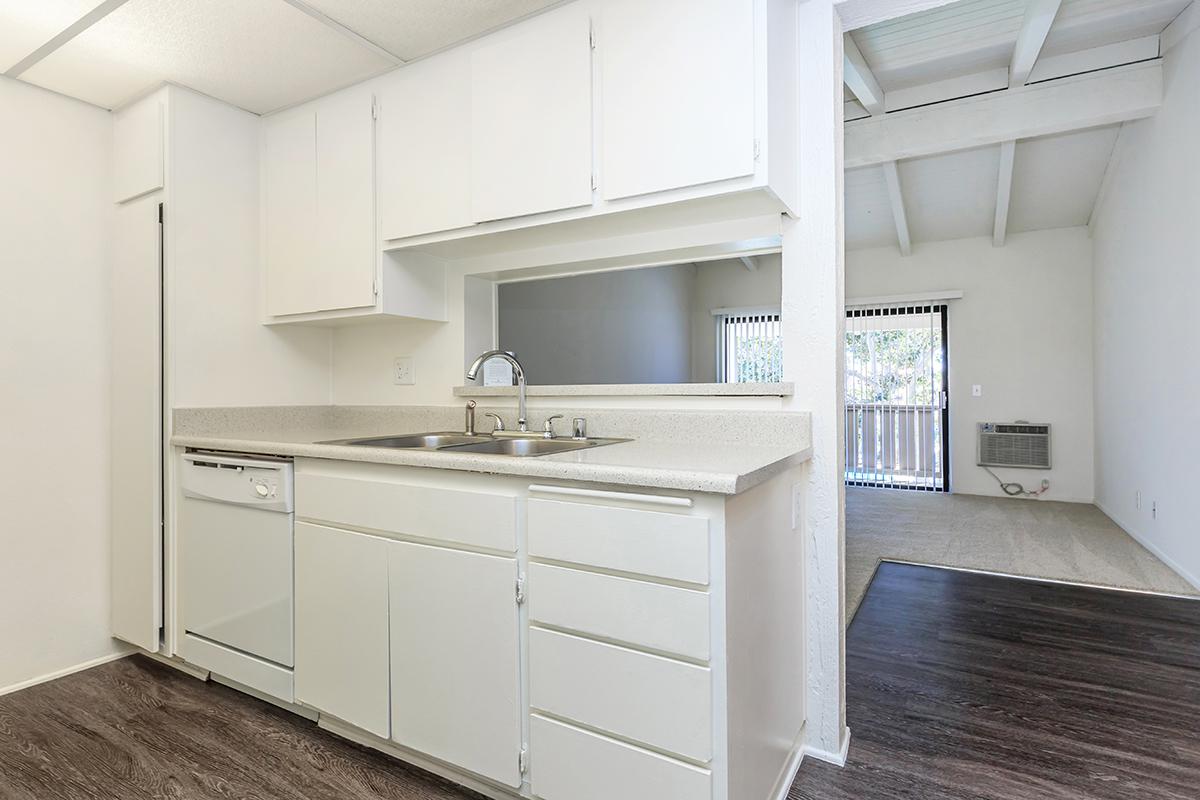 Kitchen sink with white cabinets