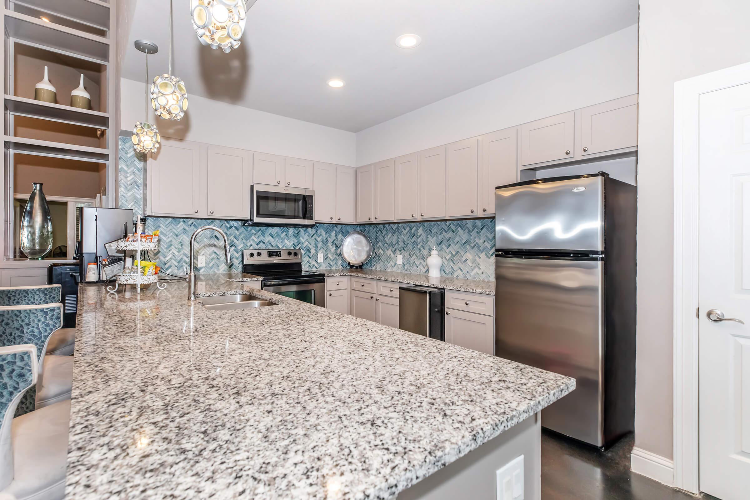 a kitchen with a sink and a window