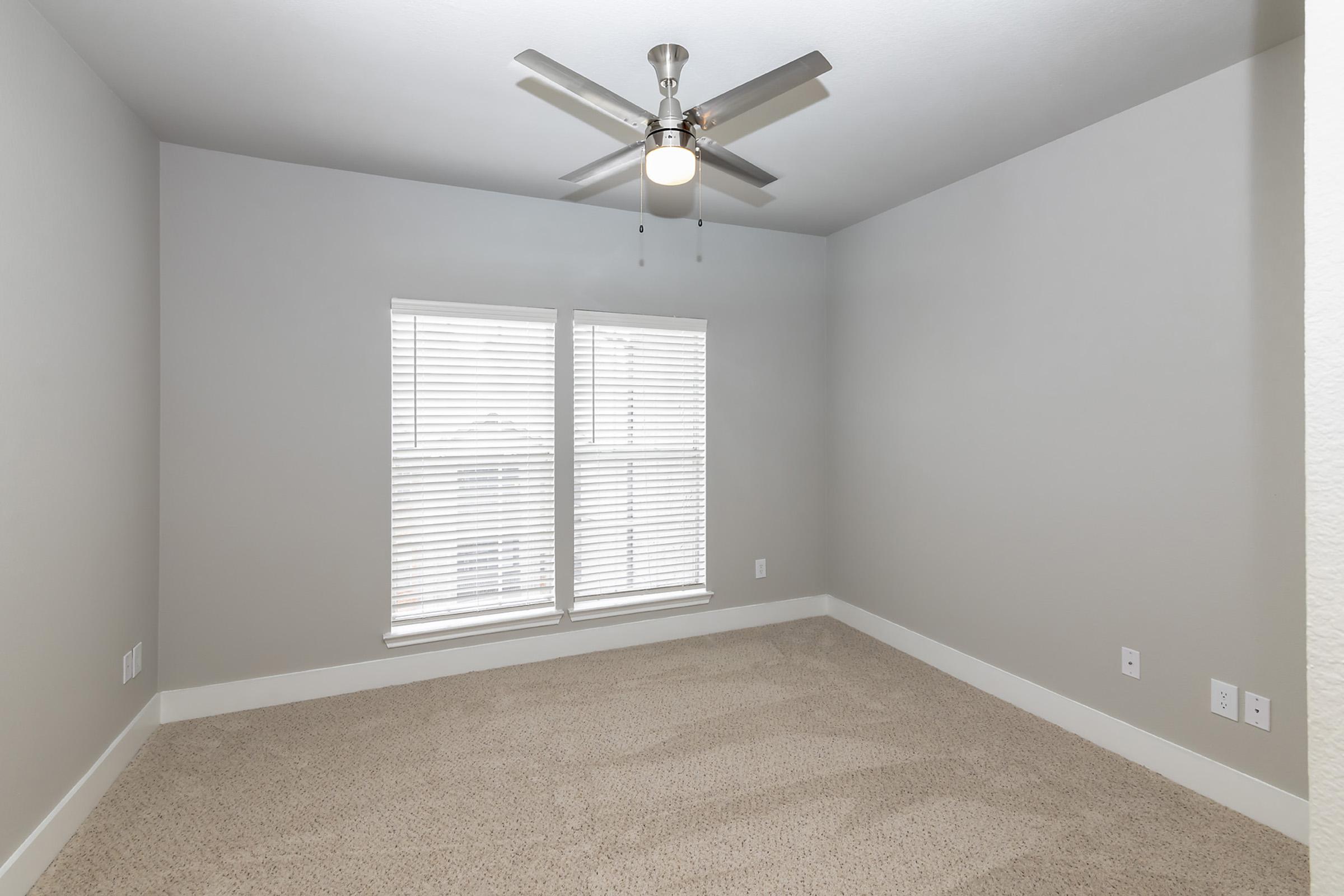 a room with a sink and a window