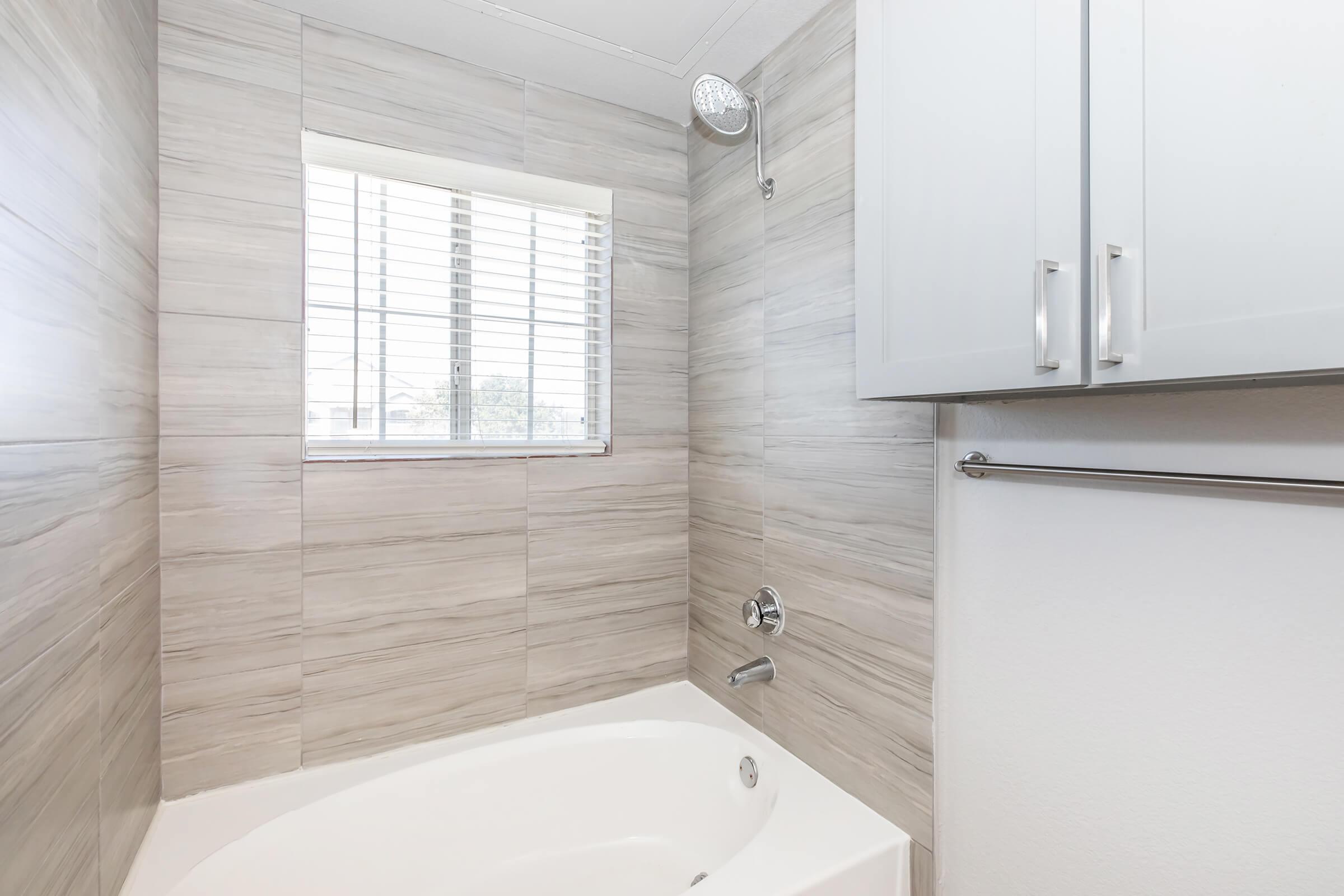 a kitchen with a sink and a window